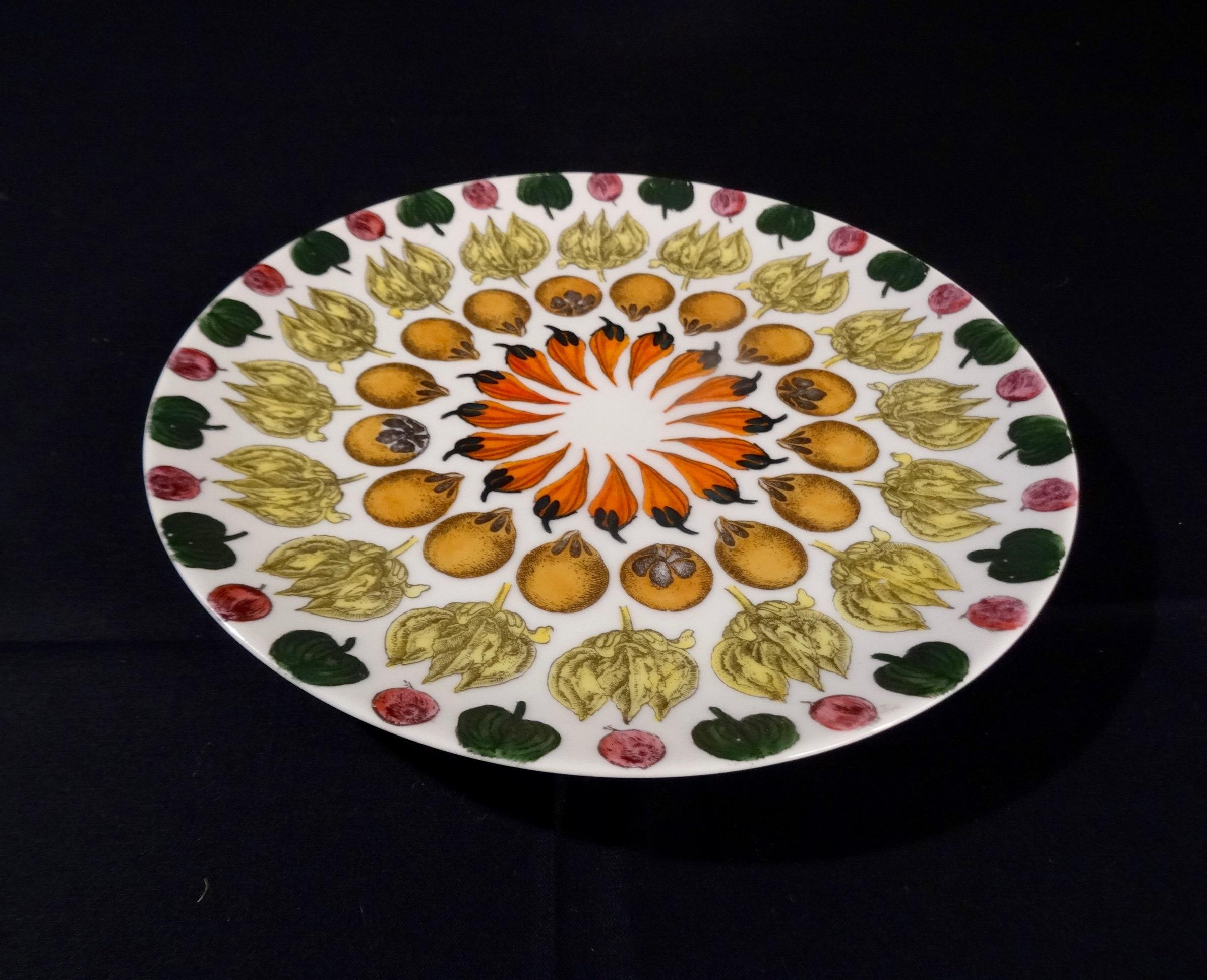 Giostra di Frutta (Carousel of fruit) plate designed in the early 1950s by Piero Fornasetti in Italy. Plate no 2. It is in very good vintage condition.