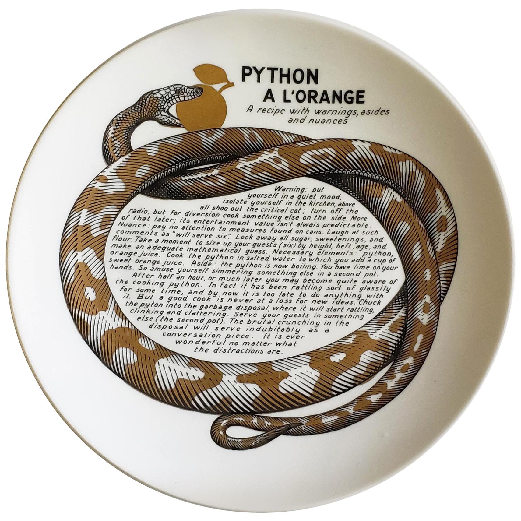 Piero Fornasetti Fleming Joffe Porcelain Recipe plate,
Python a la Orange,
1960s-1974.

This rare Piero Fornasetti porcelain plate is from a series of fourteen made for the Fleming Joffe company in New York City.

The plate originally was in a