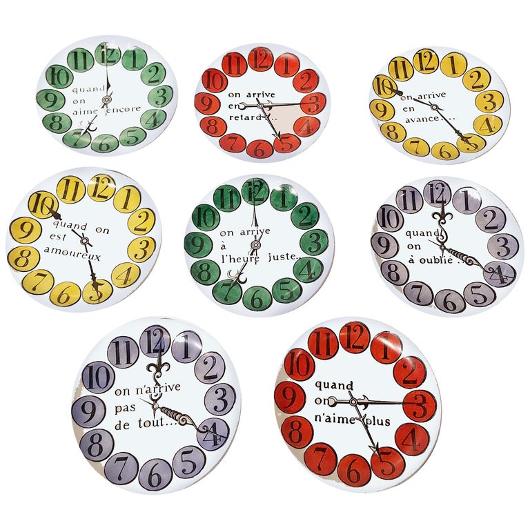 Piero Fornasetti Group of Eight Quand on Arrive Clock Coasters, When One Arrives