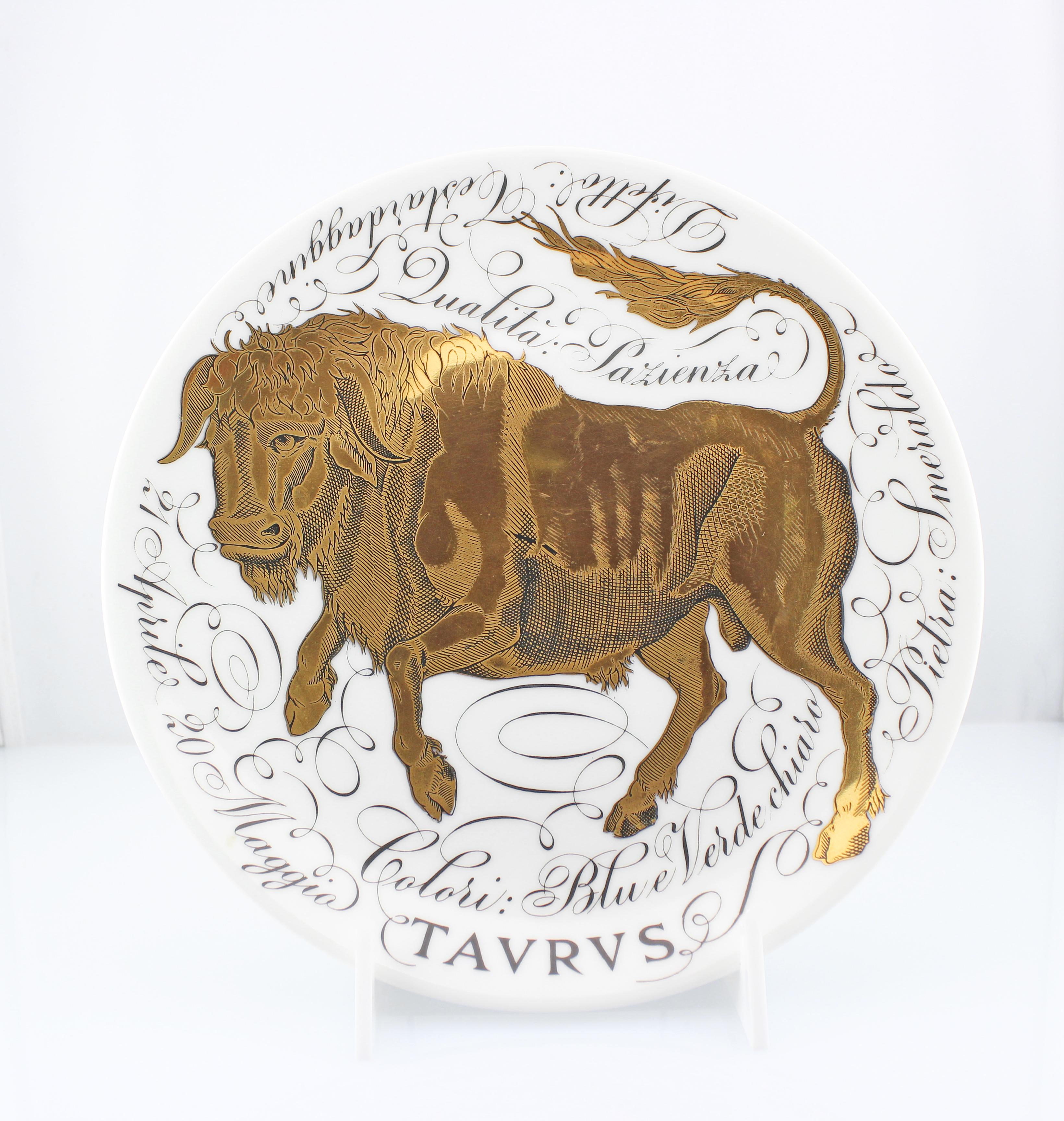 This rare and the most sought after collectibles vintage Piero Fornasetti porcelain lithographically-decorated and hand painted ceramic zodiac plate have a white background with words written in black color expressing the character and personality
