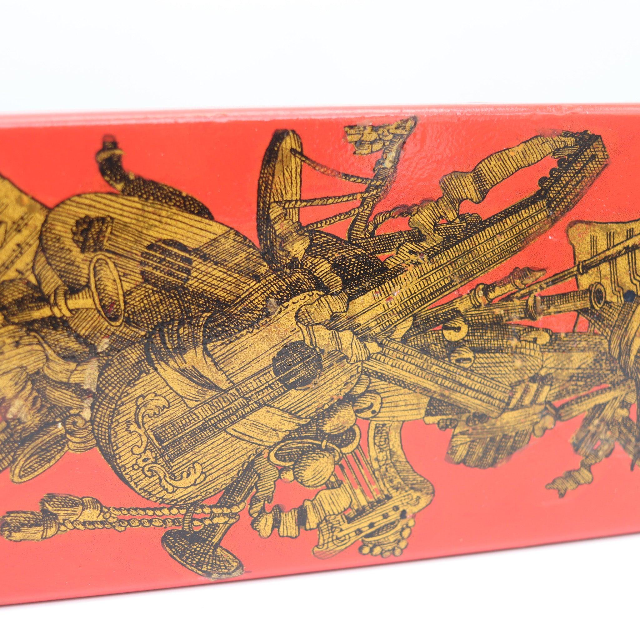An enameled sliding box designed by Piero Fornasetti (1913-1988).

This is a very rare rectangular sliding box created in Milano Italy by Piero Fornasetti. The box is from the mid-century period, crafted in the 1960's in steel and wood. The outer