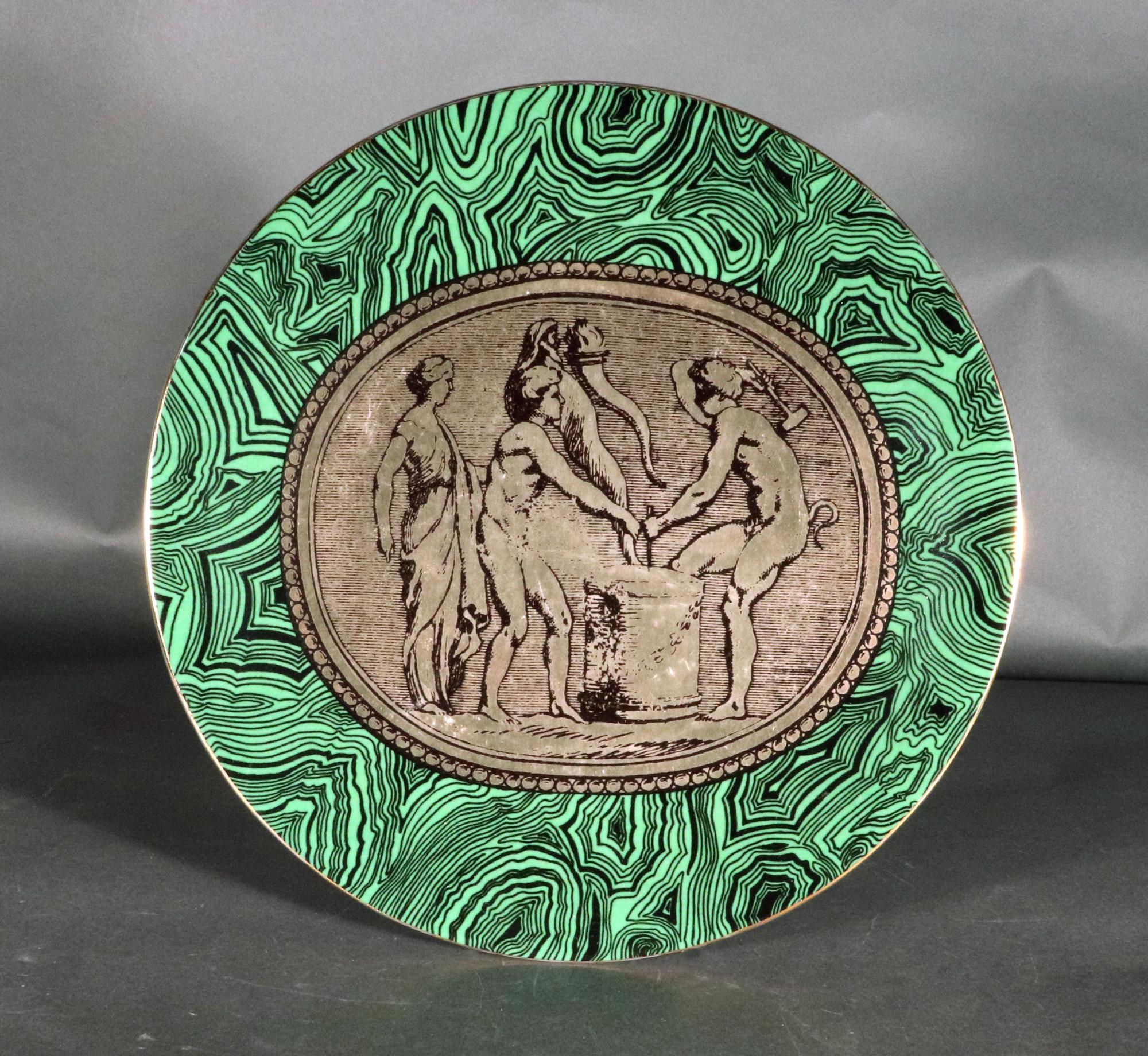 Piero Fornasetti Porcelain Green Malachite Cammei Plate,
Cammei or Cameo,
Circa 1950s-60s
From a Set of Five- sold separately.

The Piero Fornasetti porcelain plate, named Cammei on the reverse, meaning Cameo, has a ground of green malachite with a
