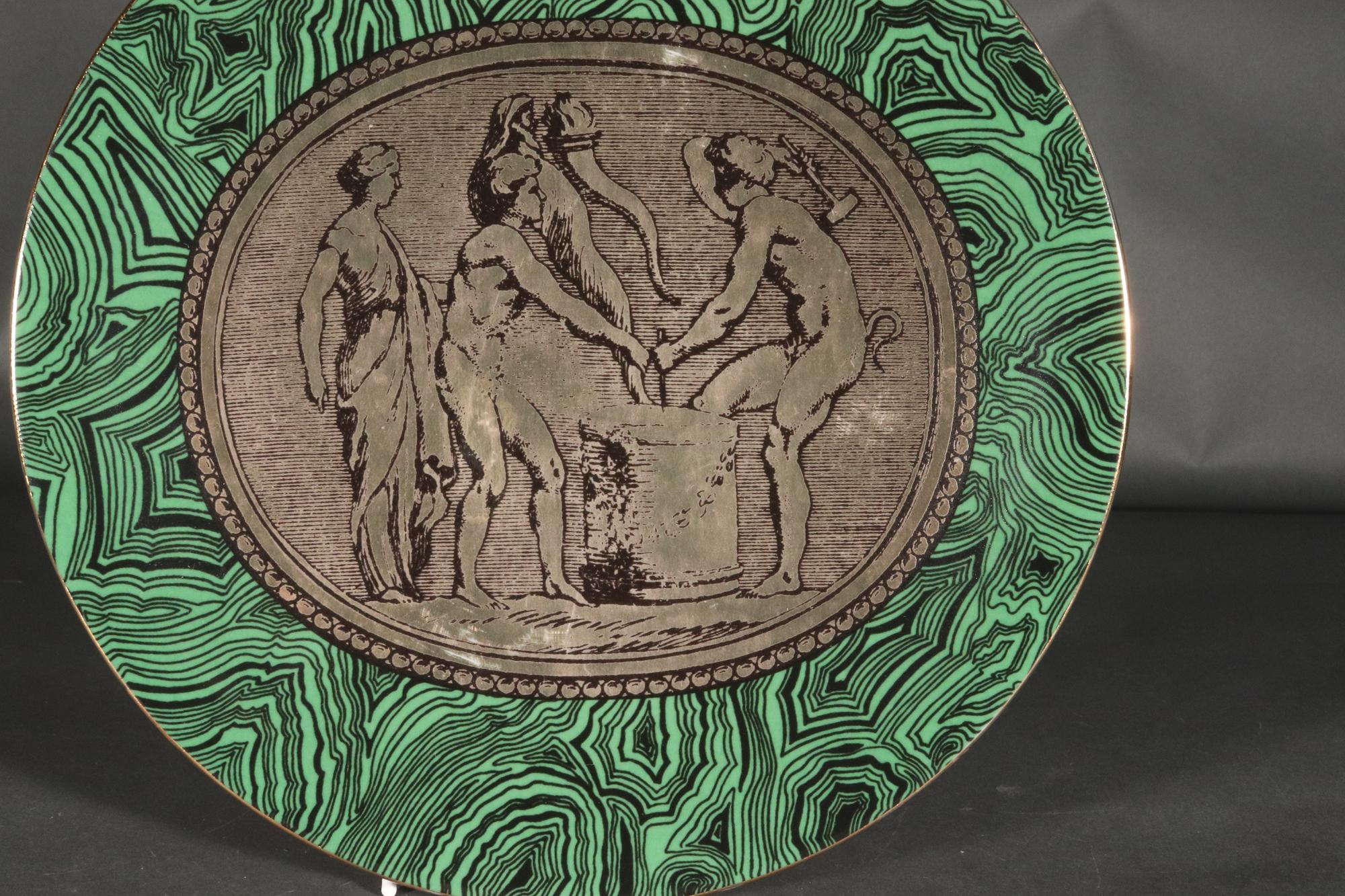 Piero Fornasetti Porcelain Green Malachite Cammei Plate,
Cammei or Cameo,
Circa 1950s-60s

The Piero Fornasetti porcelain plate, named Cammei on the reverse, meaning Cameo, has a ground of green malachite with a central panel with a Neo-classic