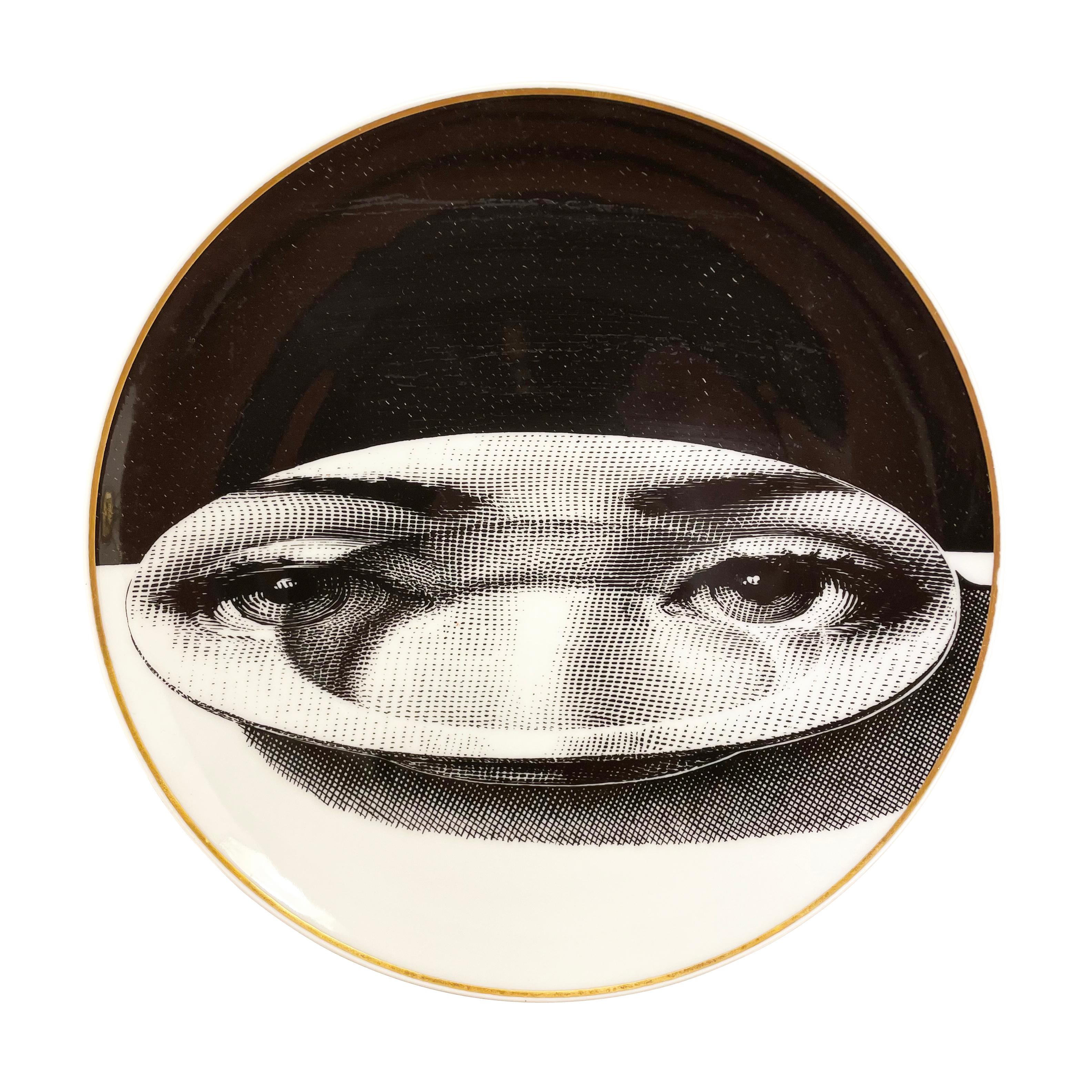 Piero Fornasetti ceramic plates made by Ronsenthal in the 1980s. All of them come from the “ Temi e Variazioni” series portraying Fornasetti’s fictional character, Giulia. Original box included. Sold individually-price per plate.

Condition: