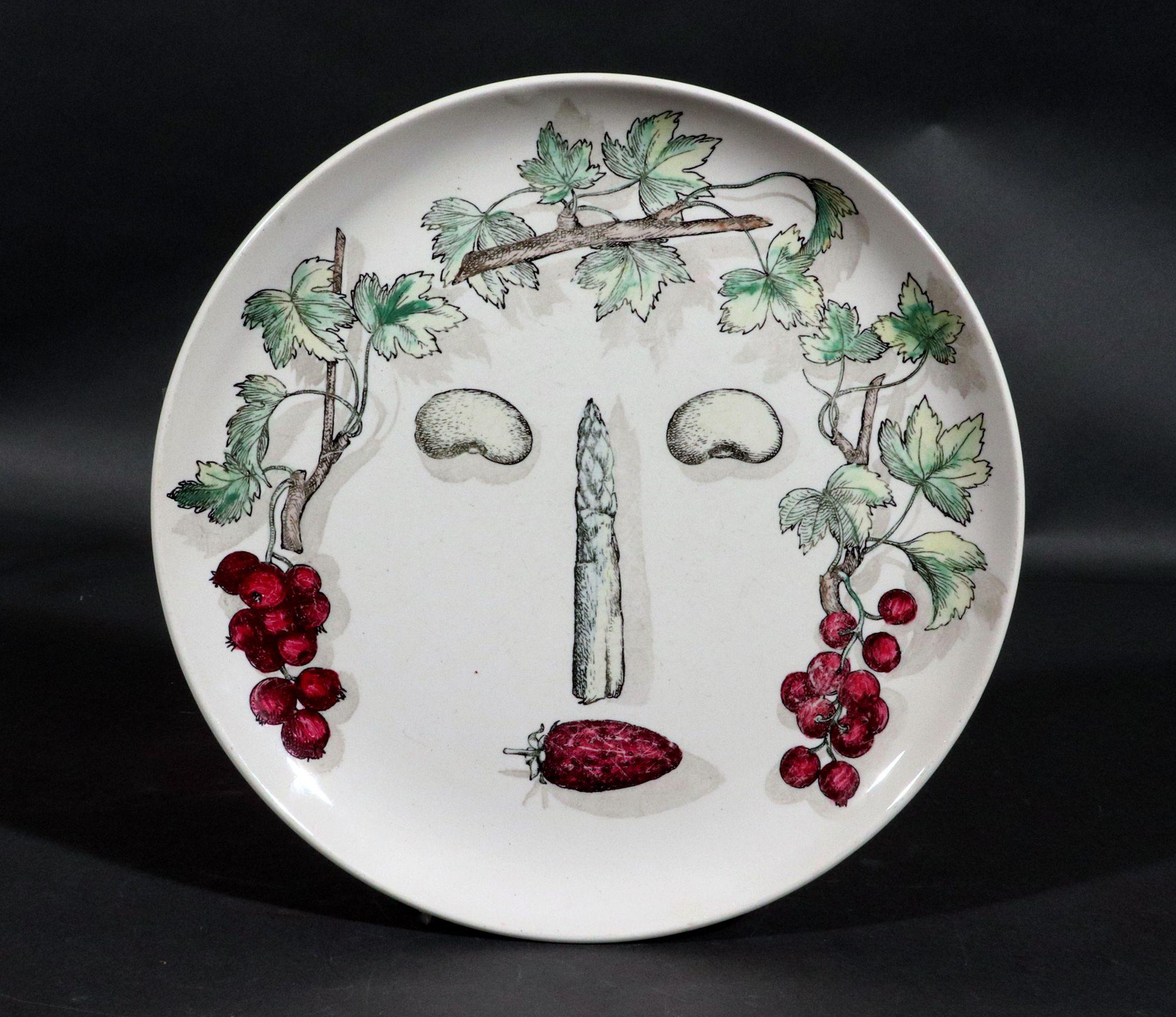Piero Fornasetti Pottery Arcimboldesca Vegetable Face Plate,
After Giuseppe Arcimboldo,
Number 12,
Circa 1960's.

The pottery plates are after Giuseppe Arcimboldo-the design of a face creatively designed with the use of various vegetables and