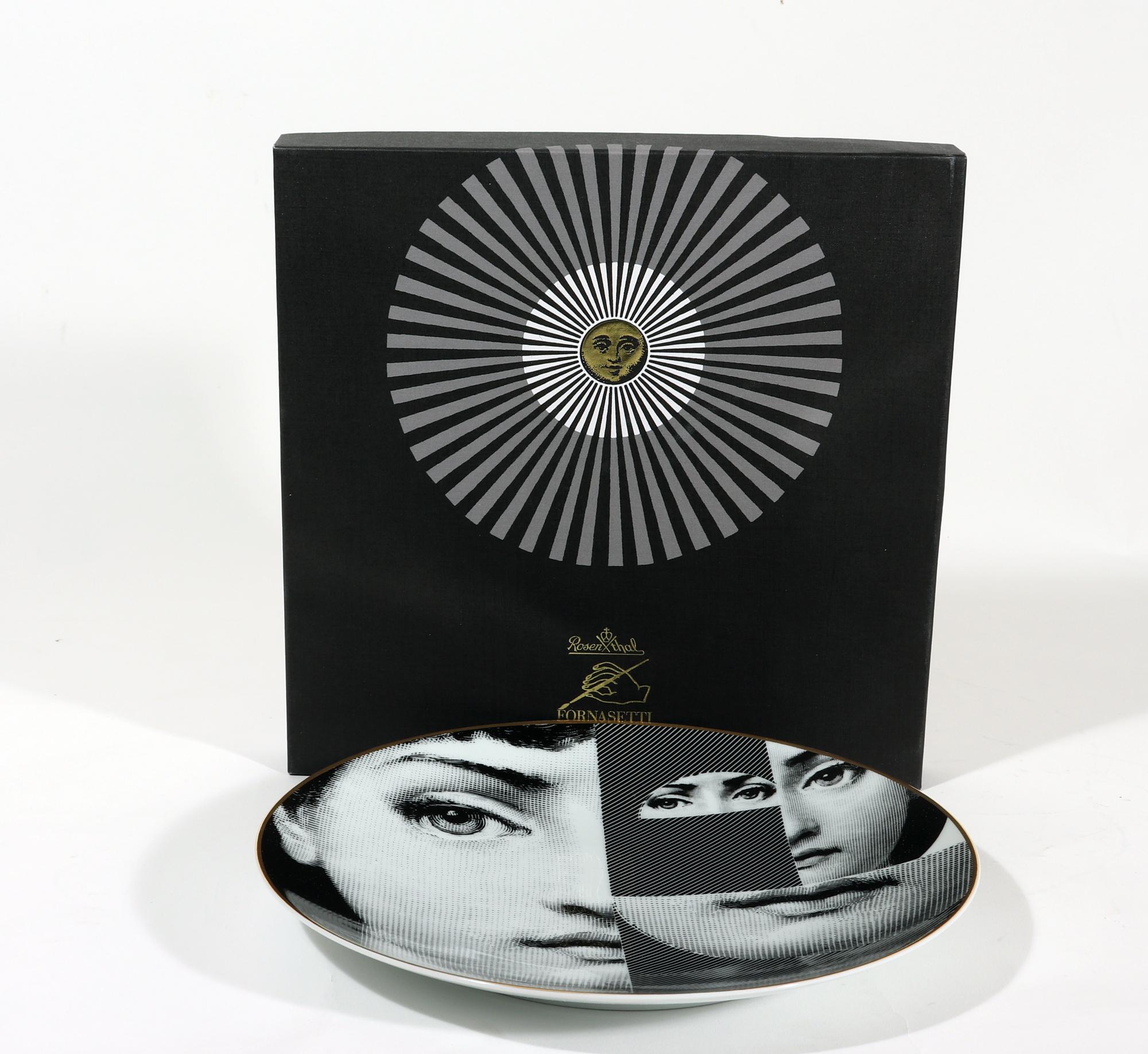 Piero Fornasetti Rosenthal Porcelain Themes & Variations Plate, Motiv 27,
With Original Box,
1980s

The Piero Fornasetti Themes & Variation design is made on Rosenthal porcelain. The pattern, Motiv 27, is rare in that it is rarely seen. The