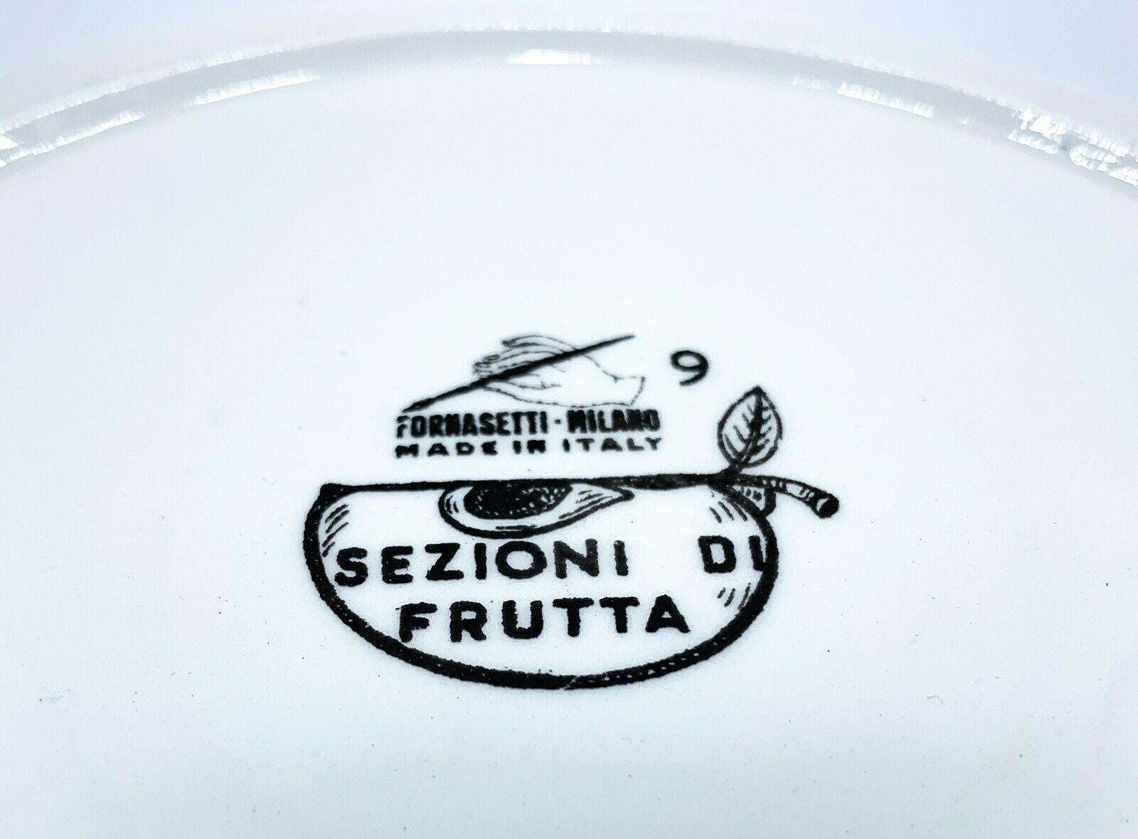 Mid-Century Modern Piero Fornasetti Sezioni Di Frutta Assiettes en porcelaine représentant une aubergine et une pomme en vente