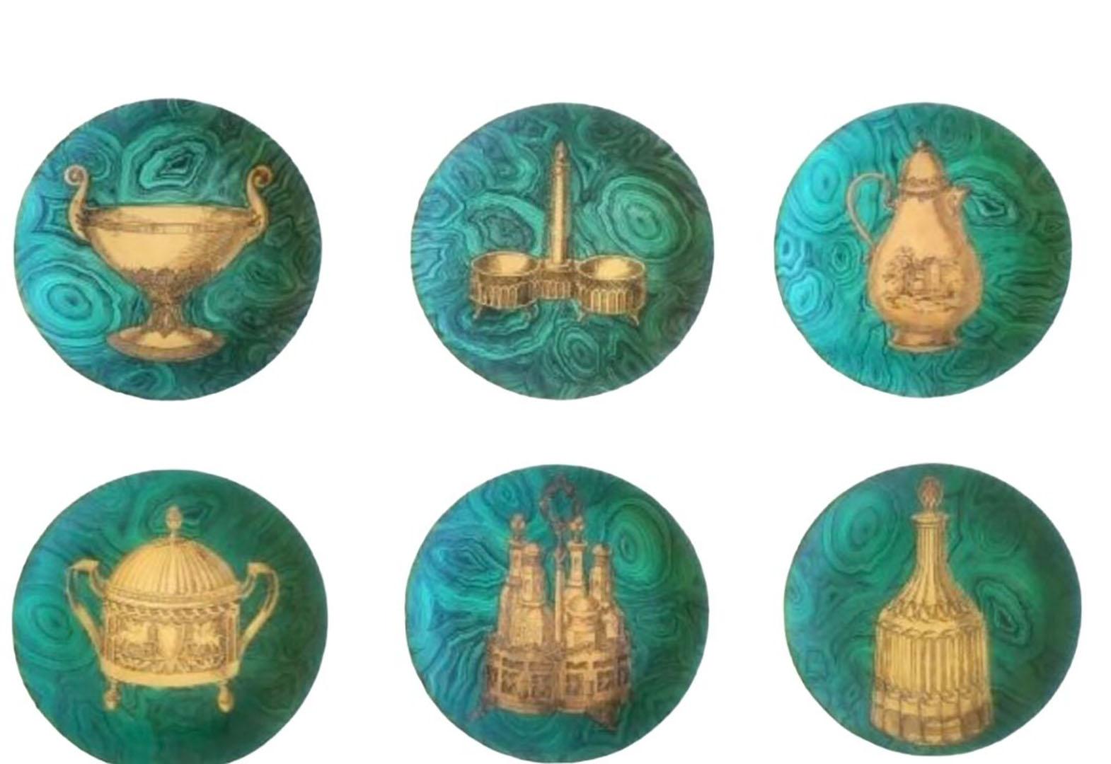 A set of twelve Stoviglie malachite plates by Piero Fornasetti with gold designs of pitchers, gilt cup and saucer, urns, vases, curette and more. Circa 1950, Italy. Ref. Fornasetti, the complete Universe, Barnaba Fornasetti. Pg.614, #162 plate with