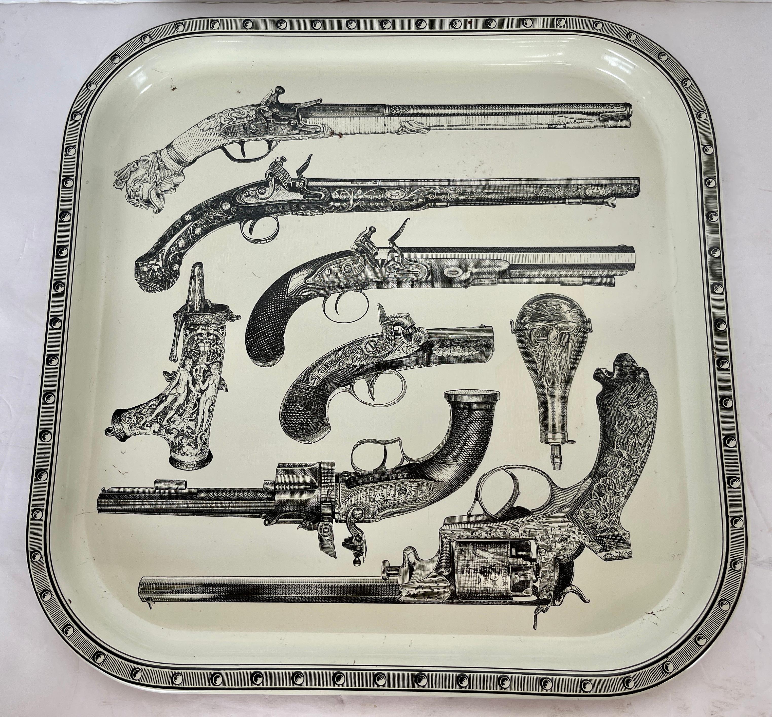 Just in, this Italian serving tray attributed to Piero Fornasetti, 
I say attributed for the lack of having a label at the back, to my knowledge it is from the Fornasetti Studio.
This is a well known  design by the artist.
Made in Italy in the