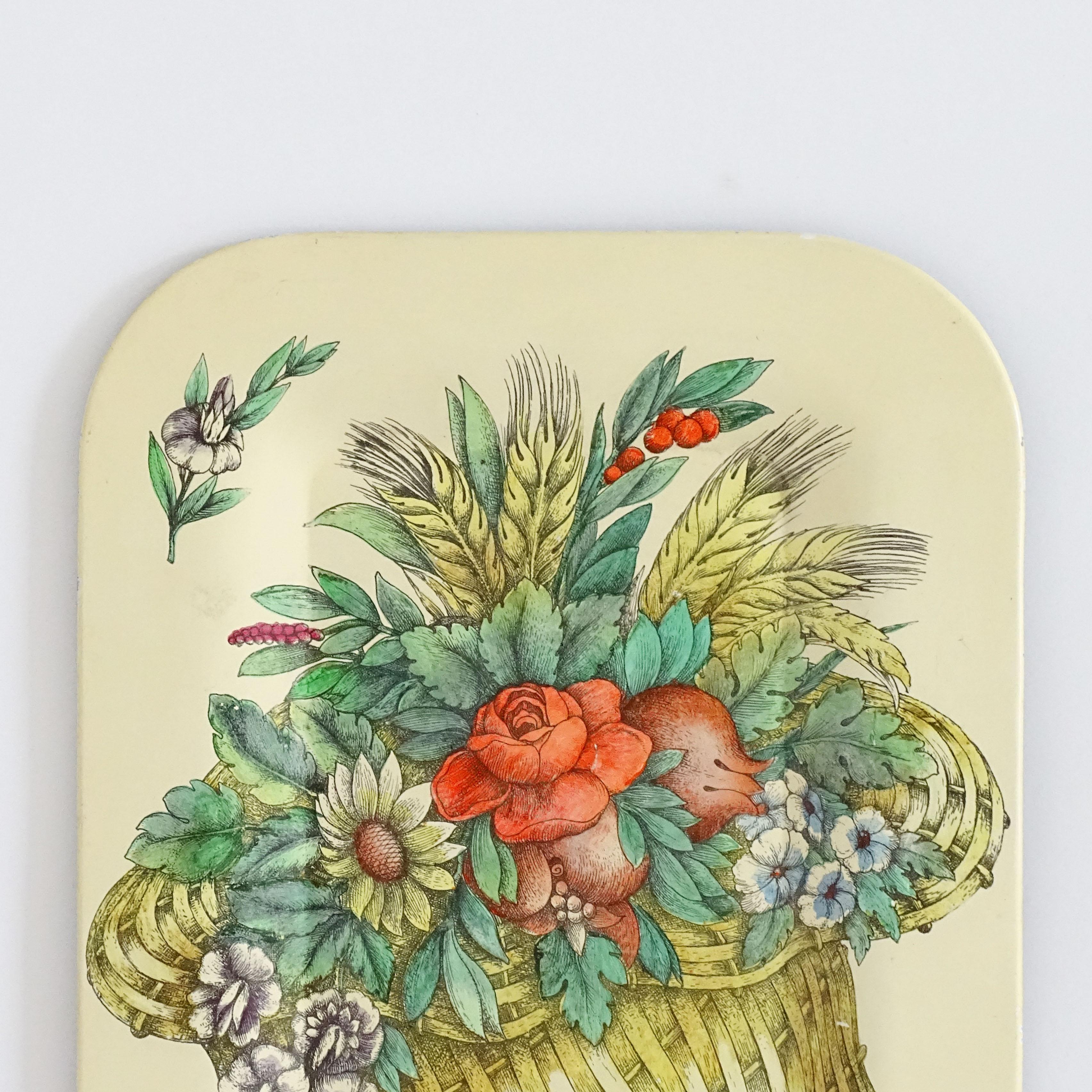 Piero Fornasetti Cornucopia with Flowers early serving tray.
Original Label.
Featuring a Wicker Cornucopia holding Flowers, Roses, Pomegranates and Wheat.
Beautiful Patina and condition.

  