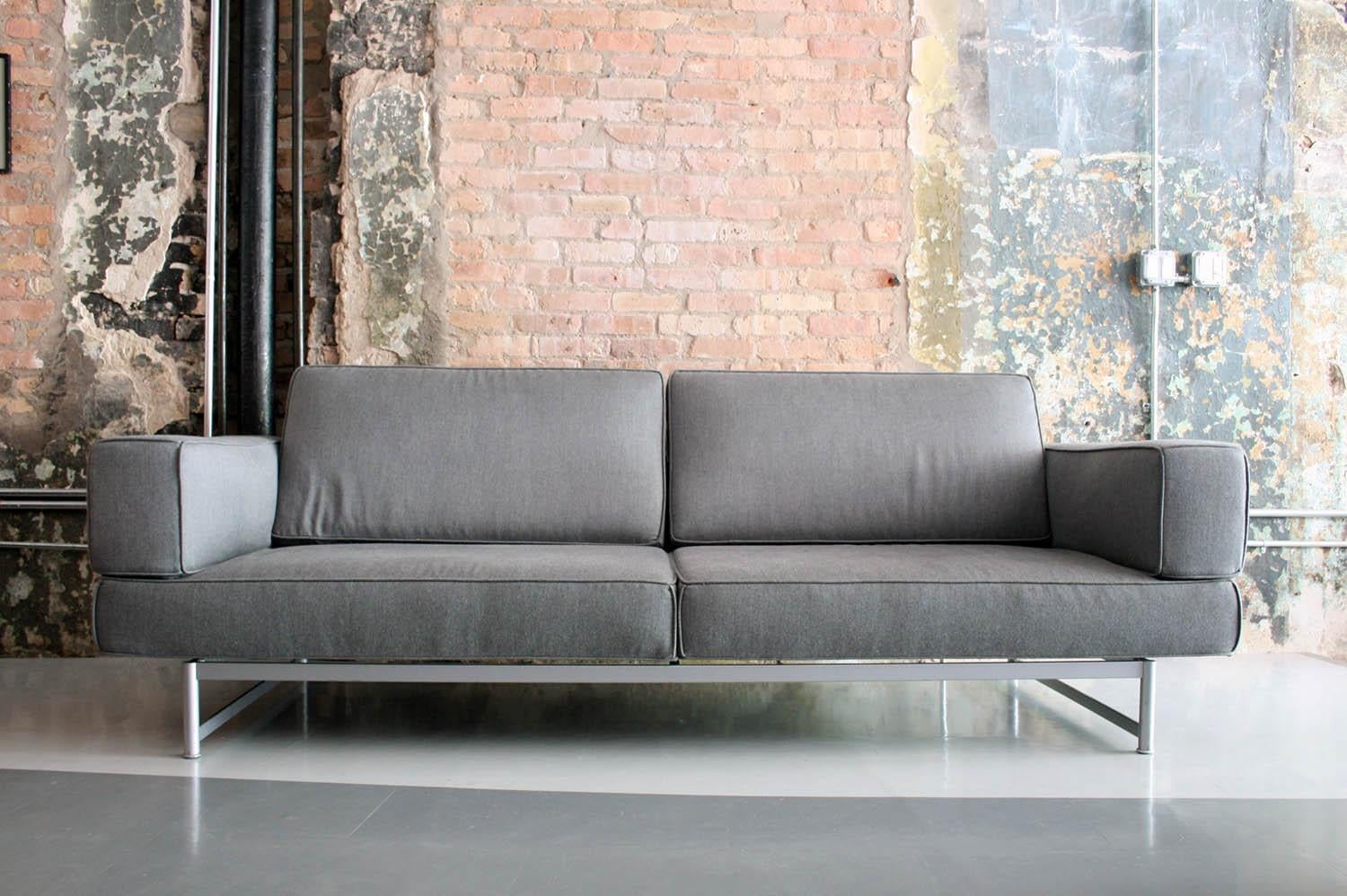 Piero Lissoni Reef sofa for Cassina Italy in grey wool felt upholstery. The back rests can be lifted up to adjust for head support. Excellent overall condition and very comfortable.