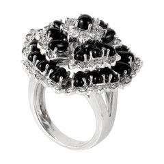 Piero Milano 18 Karat White Gold Onyx and Diamond Flower Ring