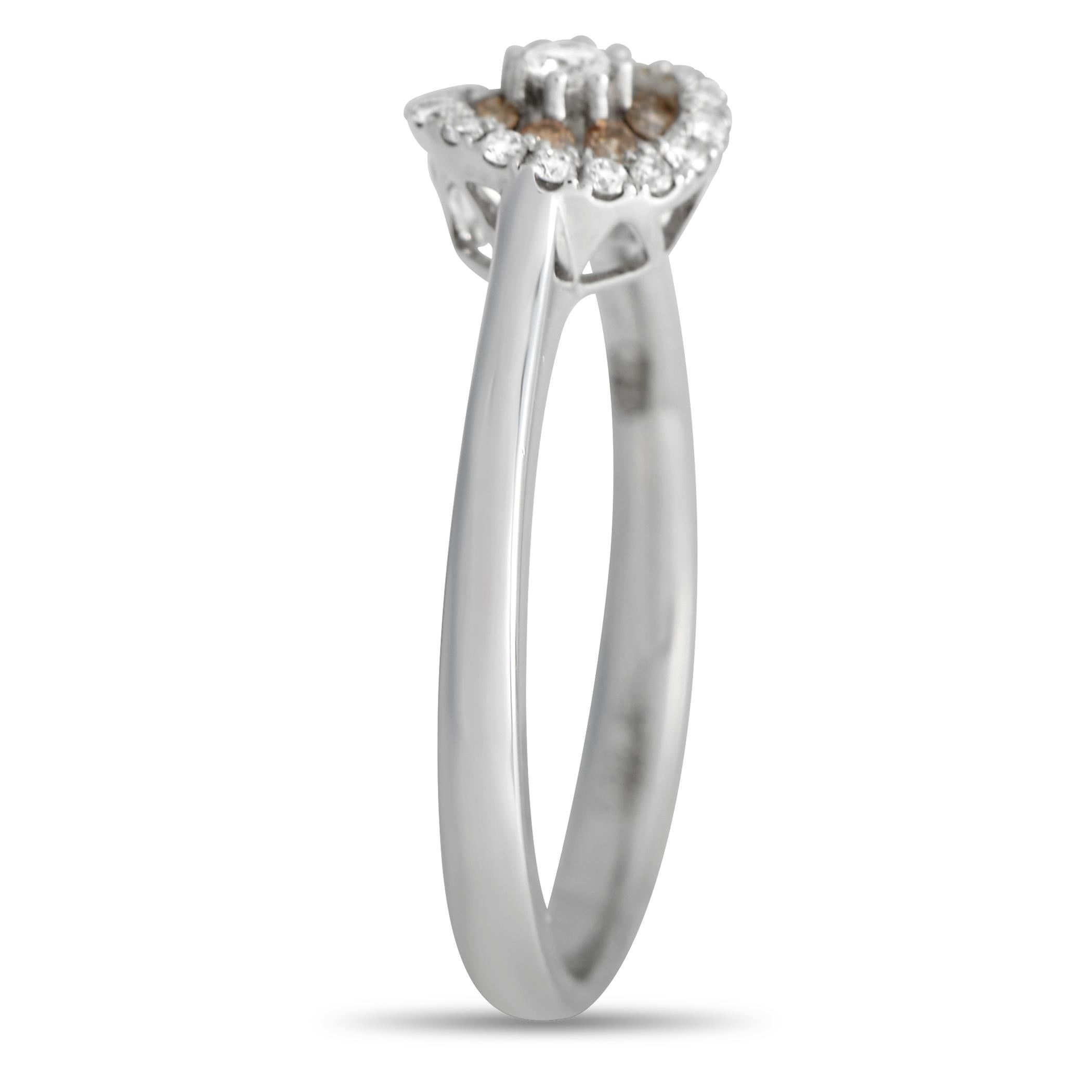 Light and dark colored diamonds totaling 0.28 carats come together in perfect harmony on this simple, elegant Piero Milano ring. The minimalist 18K White Gold setting features a 2mm wide band and a 5mm top height, making it a comfortable piece that