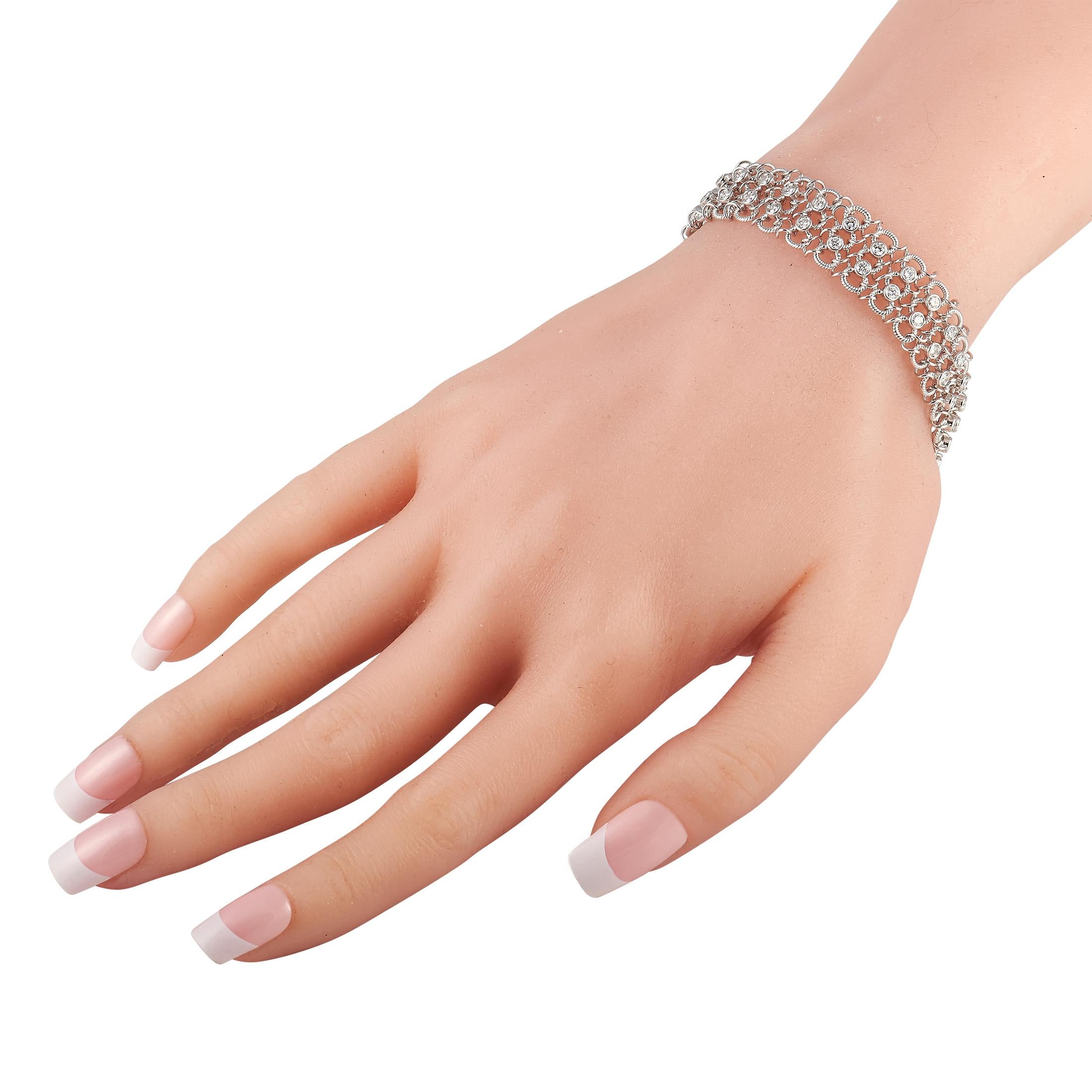 Adorn your wrist with this diamond mesh bracelet for an elegantly chic look. This Piero Milano creation features an 18-karat white gold mesh bracelet made up of intertwined links and round diamond accents that total 3.05 carats. This flexible
