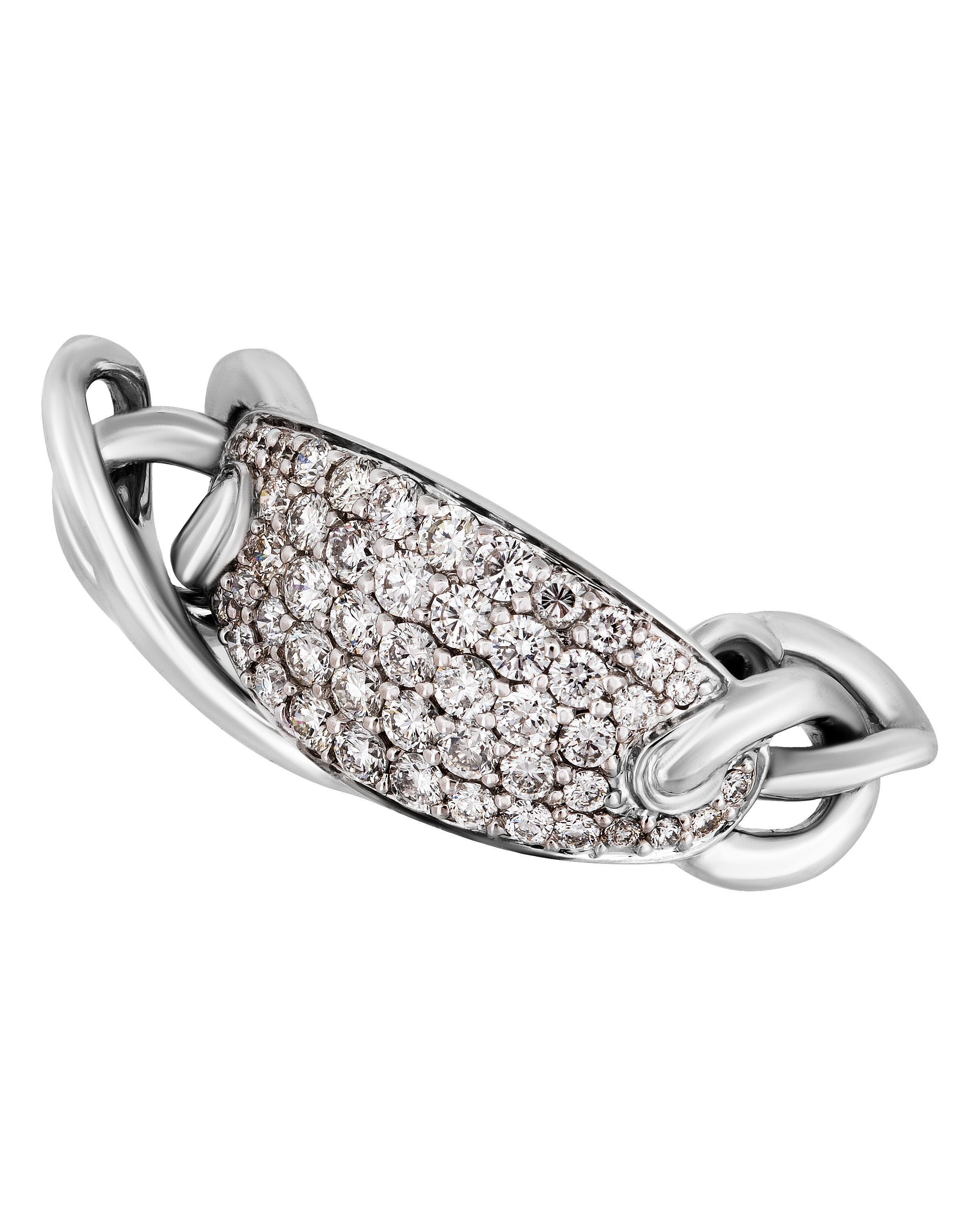 This glittering Piero Milano 18K White Gold Link Ring features a dazzling diamond station 0.69ct. tw. linked to a luscious white gold band. The ring size is 6.5 (53.1). The Decoration Size is 8.9mm. The Weight is 5.4g. Diamond Color: G-H. Diamond