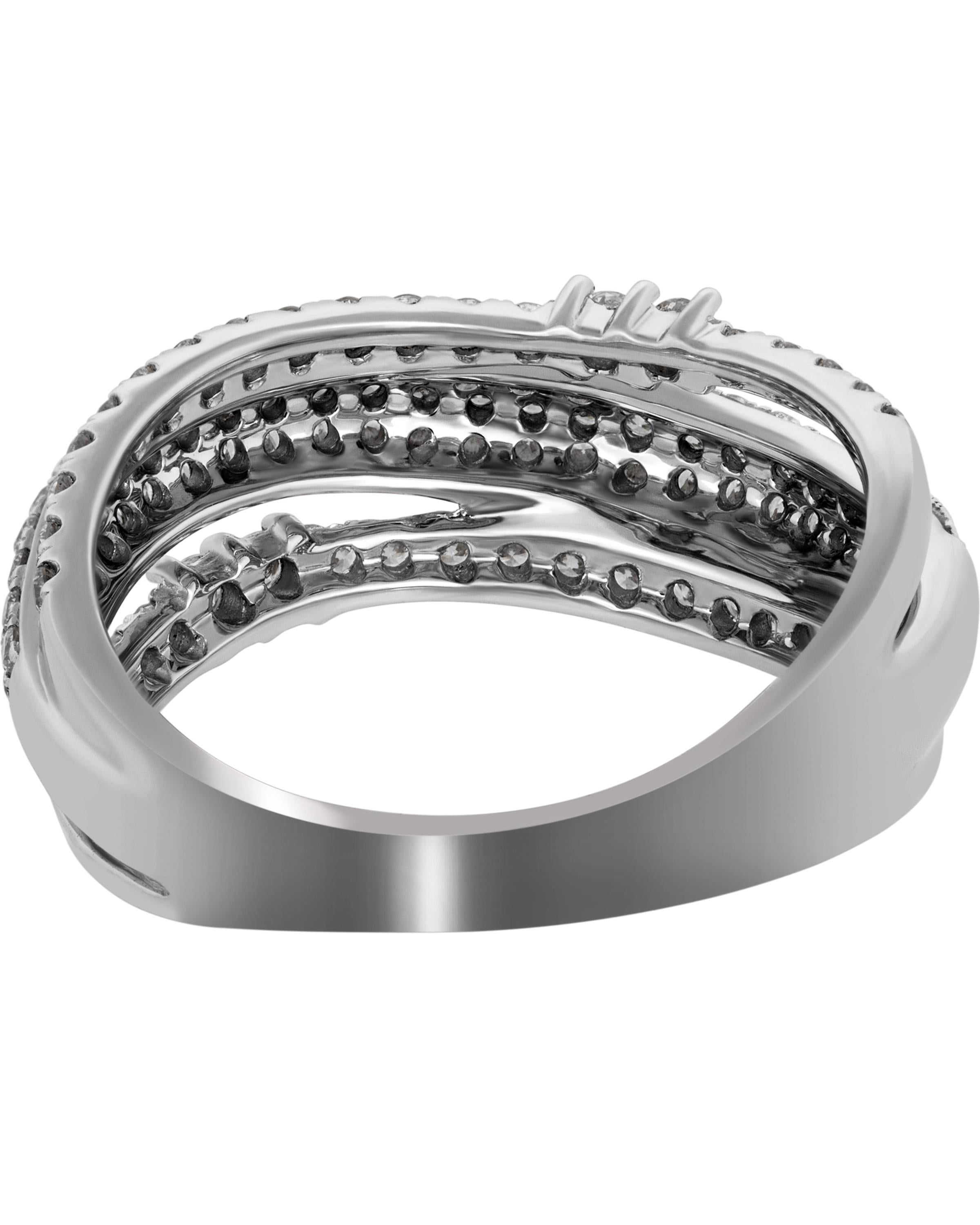 This brilliant Piero Milano 18K White Gold Curved Ring features shimmering French pave arches detailed with diamonds in a shared prong setting 0.77ct. tw. The ring size is 6.5 (53.1). The Band Width is 8.1mm. The Weight is 4.6g. Diamond Color: G-H.