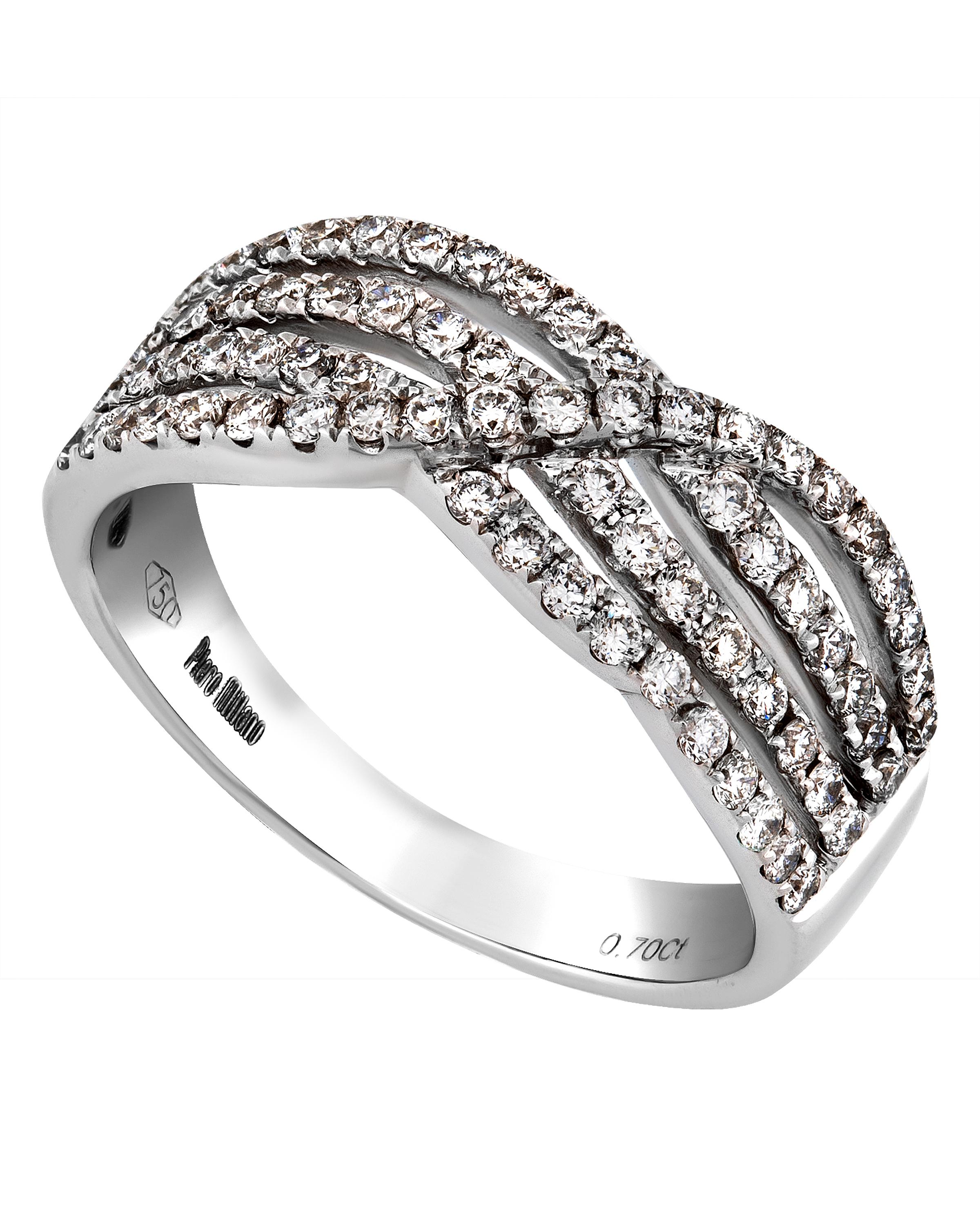 This graceful Piero Milano 18K White Gold Highway Ring features a waved diamond strand overlapping three glittering layers of diamond pave 0.7ct. tw. The ring size is 7.25 (55.1). The Band Width is 7.7mm. The Weight is 5.1g.
