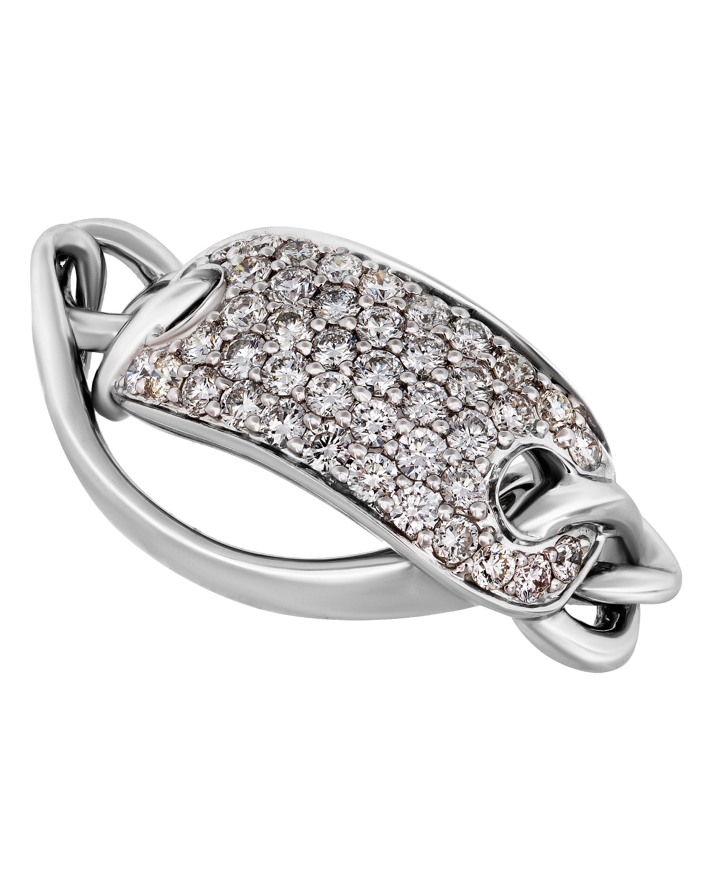 This glittering Piero Milano 18K White Gold Link Ring features a dazzling diamond station 0.97ct. tw. linked to a luscious white gold band. The ring size is 7.25 (55.1). The Decoration Size is 9mm. The Weight is 5.6g.
