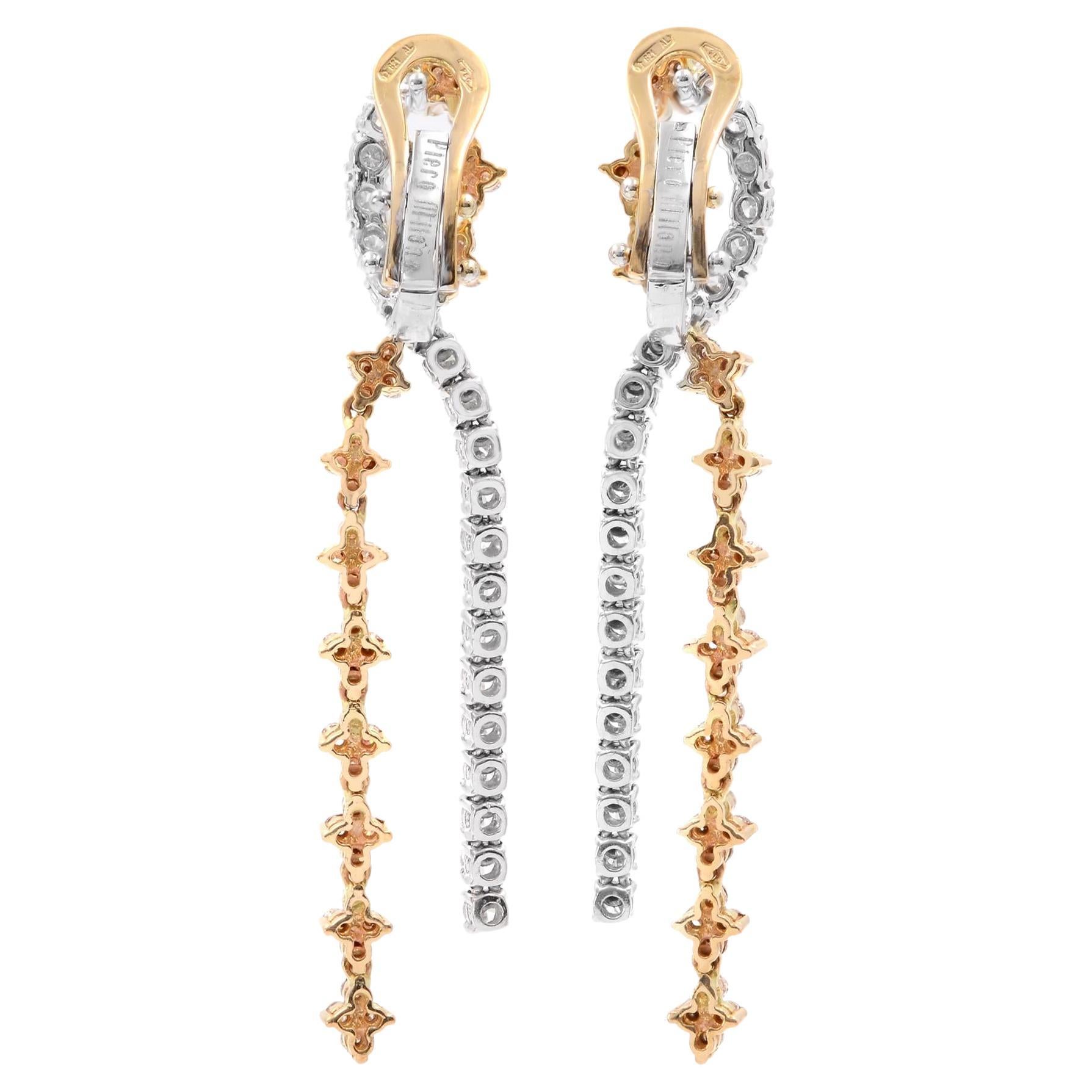 Natural diamond double row drop earrings in 18K white and rose gold. This elegant pair of earrings designed by Piero Milano features two Long Rows of diamond. Total carat weight 2.26cttw. Diamond color G-H  and VS-SI clarity. Weights 10.30 grams.