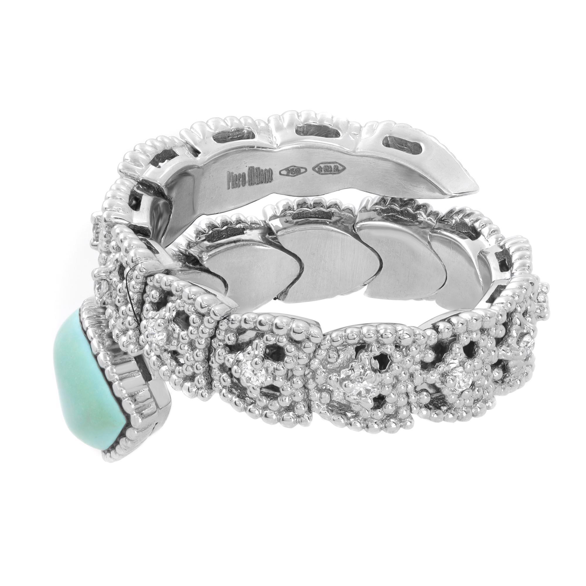 A gorgeous Piero Milano 18K White Gold Diamond Flexible Ring. It has a Beautiful Turquoise stone connected to the Double Flexible Ring Decorated by a set of 16 Diamonds 0.18 cttw, G-H Color and VS-SI Clarity. The Ring Weights 9 grams. Size 6.5. It