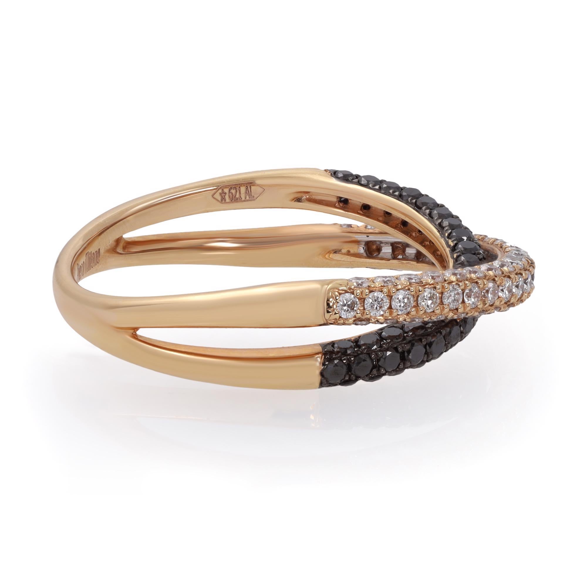 18k Rose Gold white and black diamond crossover ring by Piero Milano. This beautiful piece is set with 0.53cts of white diamond and 0.51cttw of black diamond. The Clarity G-H and Color VS-SI. Ring size 8. Comes with a box and Chronostore appraisal. 