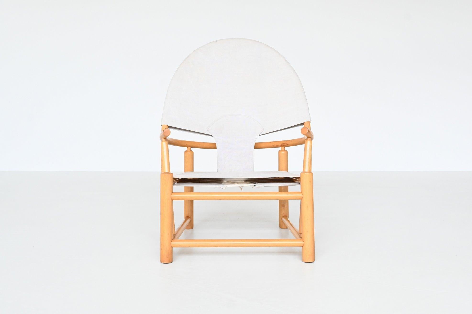 Beautiful shaped lounge chair model G23 Hoop chair designed by Piero Palange and Werther Toffoloni and manufactured by Germa, Italy 1972. This very nice chair features a solid bent beechwood frame with a canvas upholstery. It has a very nice hoop