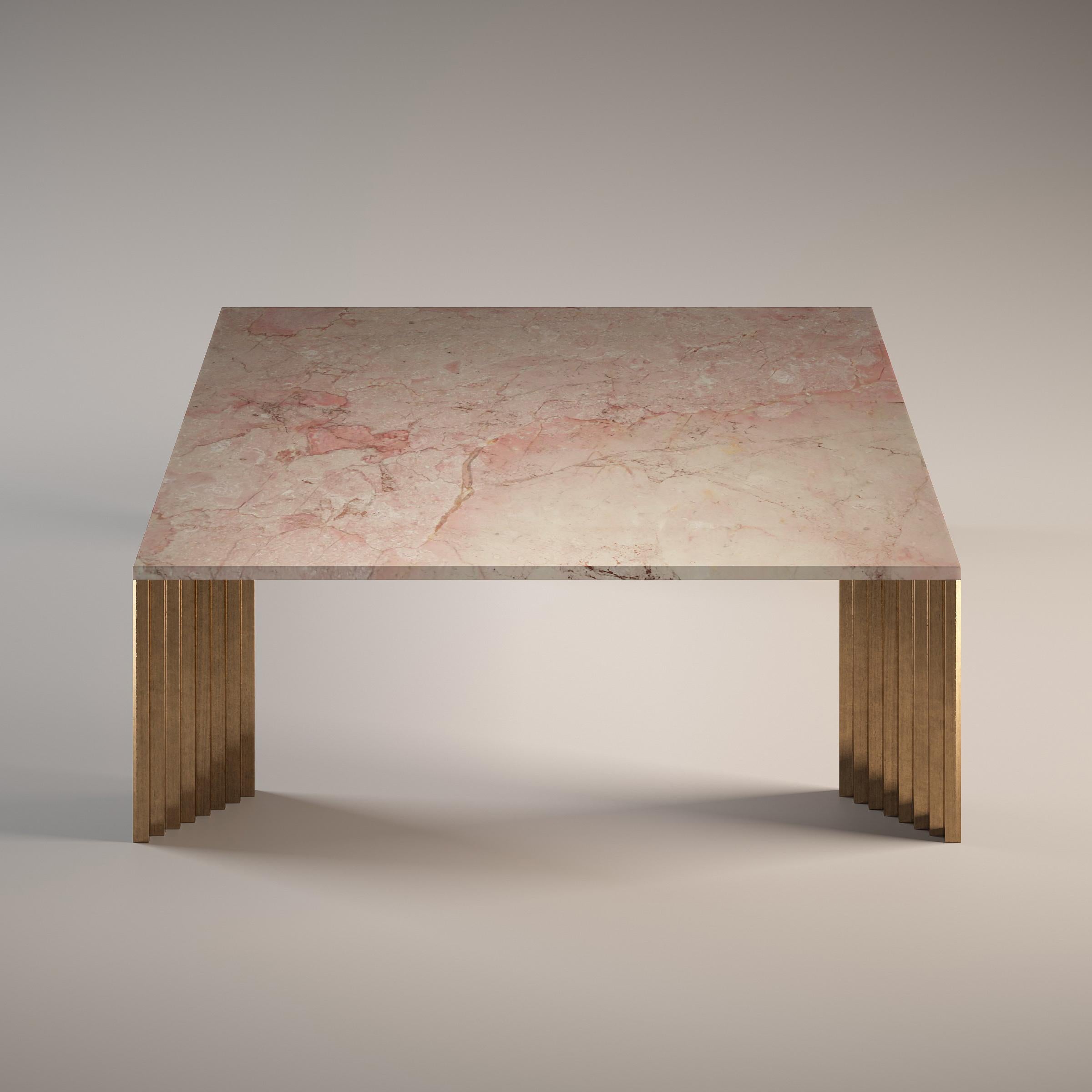 Piero Rosa Tea Coffee Table by Fred and Juul
Dimensions: D 120 x W 120 x H 40 cm.
Materials: Rosa Tea marble and bronze.

Available in White Carrara, Rosa Tea or Emperador Grey marble tops. 
Available in bronze or aluminum legs. Custom sizes,