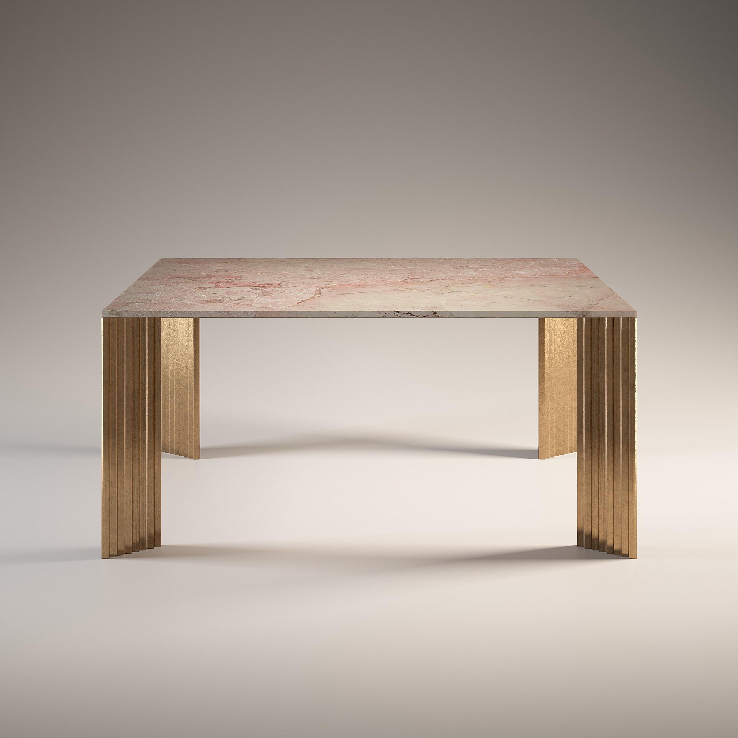 Piero Rosa Tea Dining Table by Fred and Juul
Dimensions: D 160 x W 160 x H 74 cm.
Materials: Rosa Tea marble and bronze.

Available in Rosa Tea or Emperador Grey marble tops. Available in bronze or aluminum legs. Custom sizes, materials or finishes