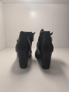 Pierre Balmain Boucle baroque noir et or Bottes pour femmes Cheville