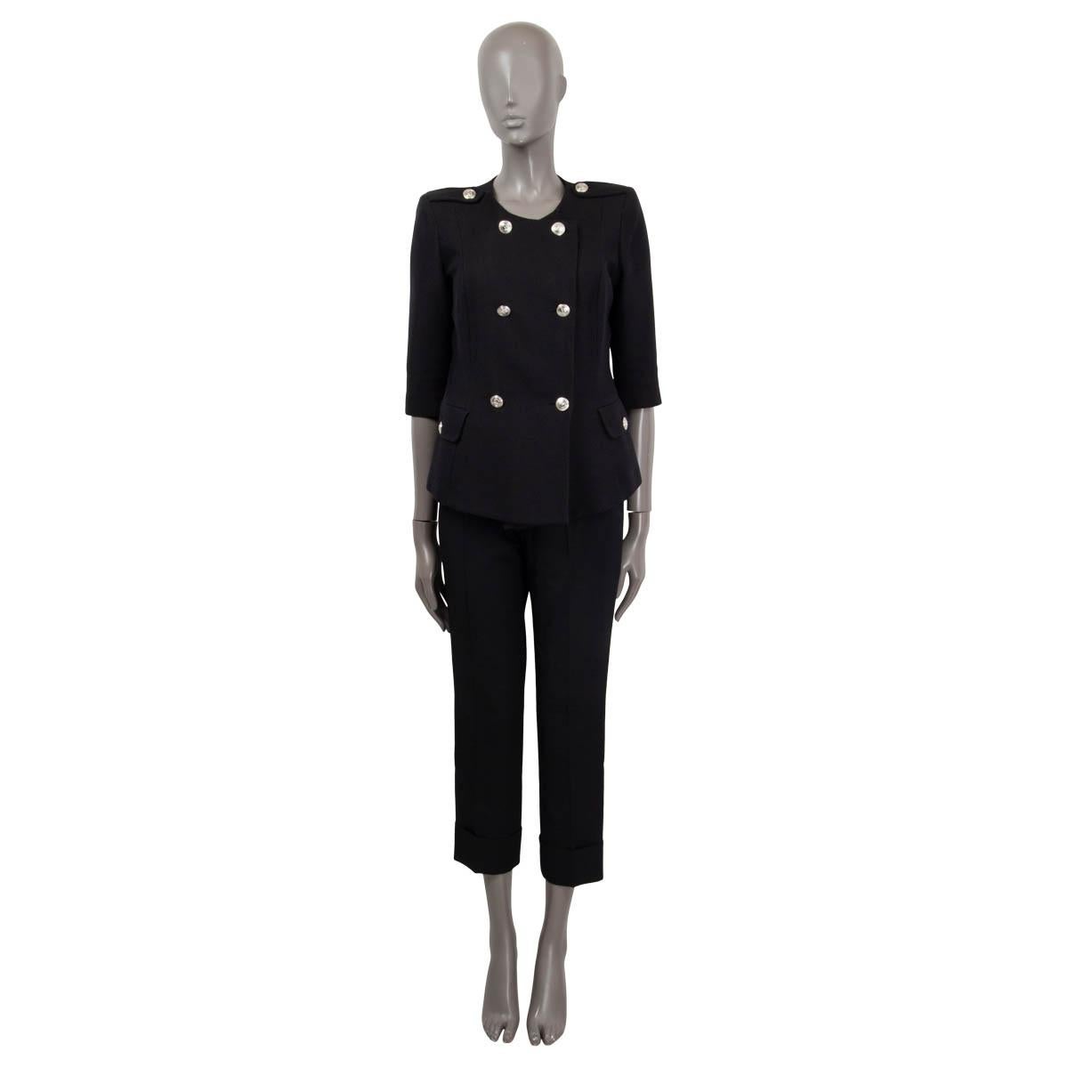 100% authentic Pierre Balmain double breasted blazer in black cotton (72%) and viscose (28%). Features epaulettes on the shoulders, 3/4 sleeves and two buttoned flap pockets on the front. Opens with buttons on the front. Lined in black viscose (52%)