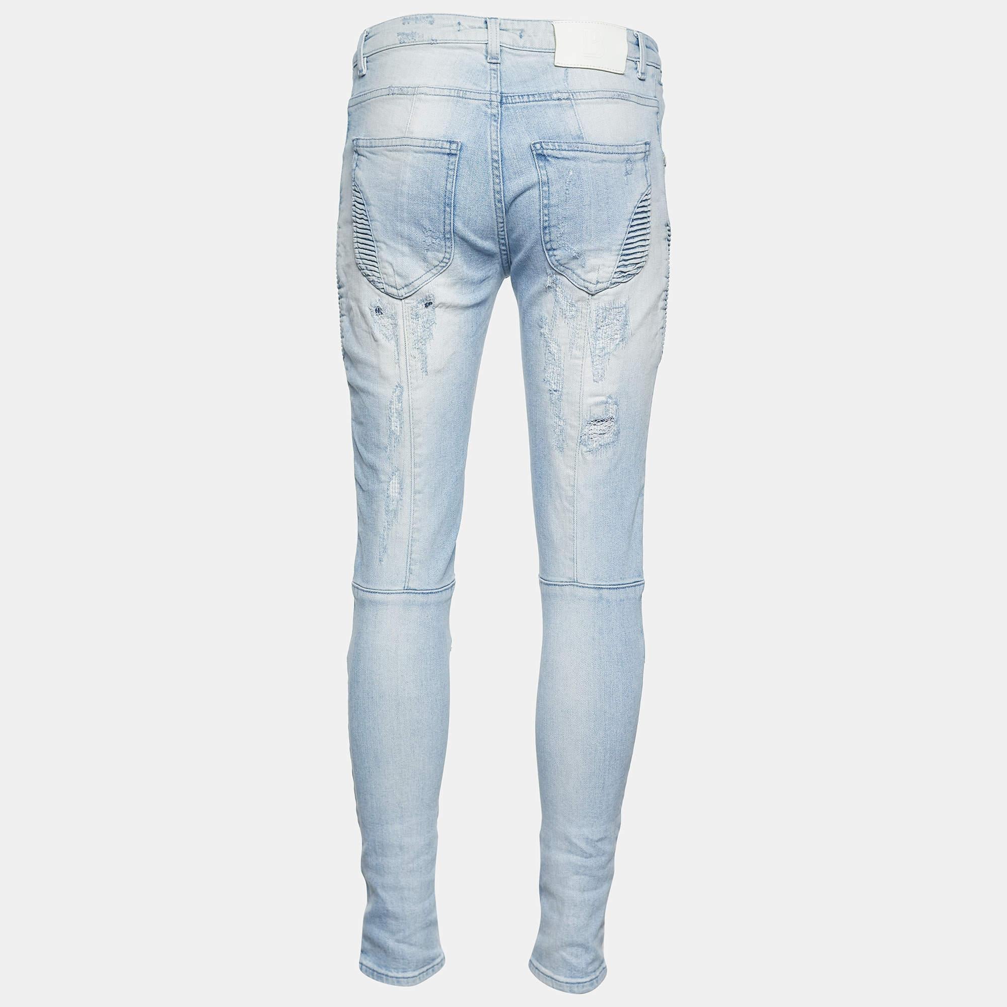 These jeans from Pierre Balmain are definitely a classy pair to own They are created using blue denim fabric and showcase distressed detailing zipper closure and four pockets. Put on these jeans and achieve a trendy casual style.