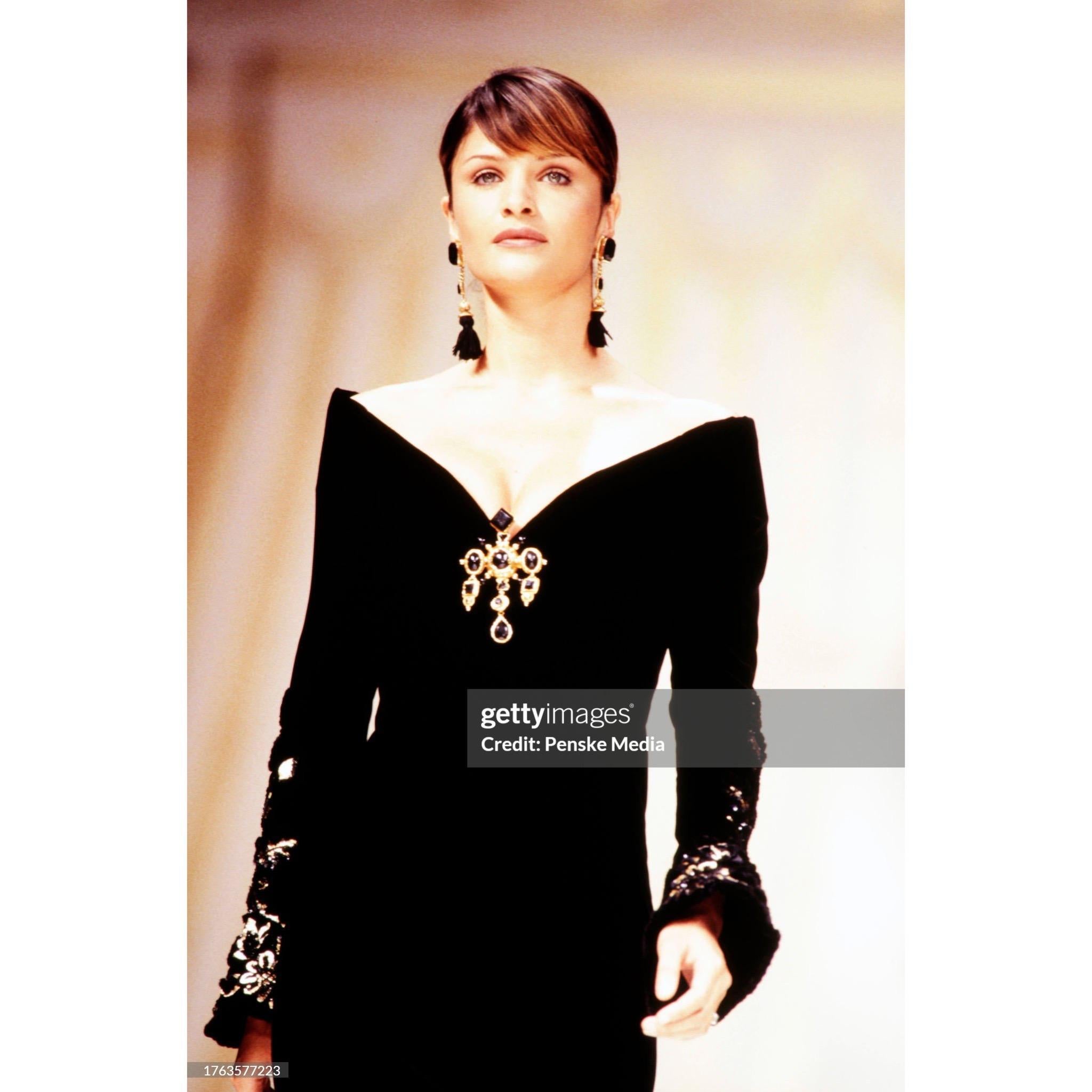 Extremely rare Pierre Balmain by Oscar de la Renta Haute Couture dress from Fall Winter 1993 collection. The dress is made of a delicate black lace with a beautiful velvet piping on the skirt, and is covered in velvet on the top and sleeves part. It