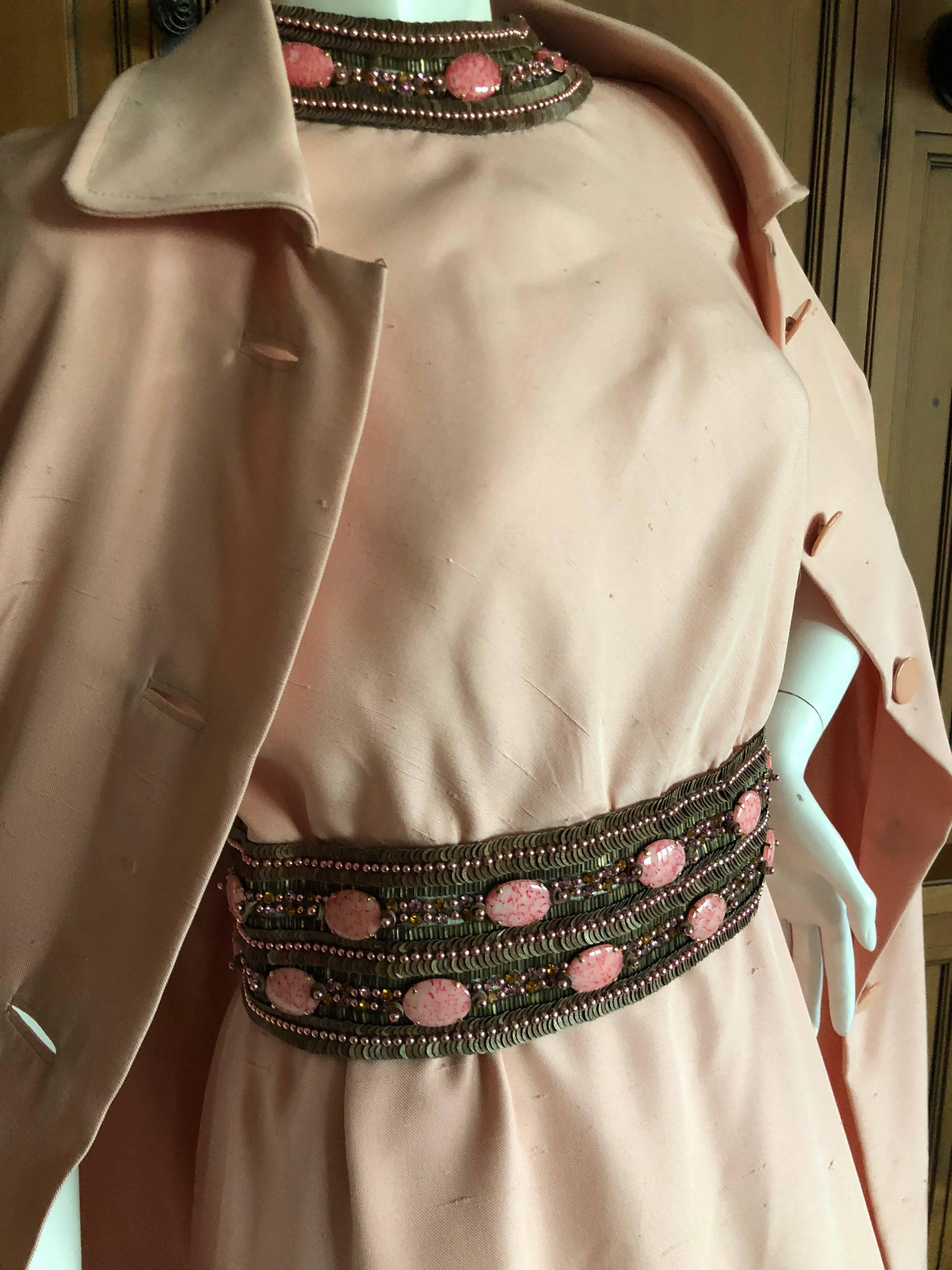 Pierre Balmain Numbered Haute Couture 1962 Evening Dress & Coat .
Both coat and dress feature numbered Haute Couture lables.
Featuring a sleeveless sheath dress with bead and cabachon embellished collar and belt, and matching coat.
The dress has a