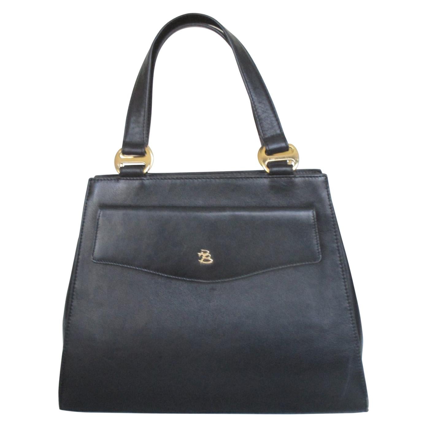 Pierre Balmain Paris - Sac de style Kelly en cuir de veau noir, années 1960, rare en vente