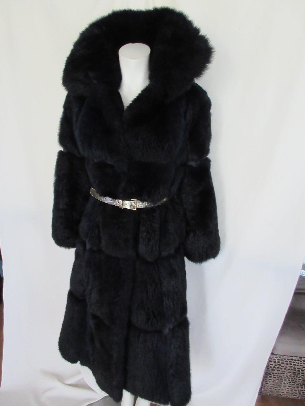 This vintage coat from Pierre Balmain is made of very soft blue dyed fur and suede leather panels.

We offer more exclusive fur items, view our frontstore

Details:
The color is dark blue with flurries of lighter blue.
With belt loops
Fully