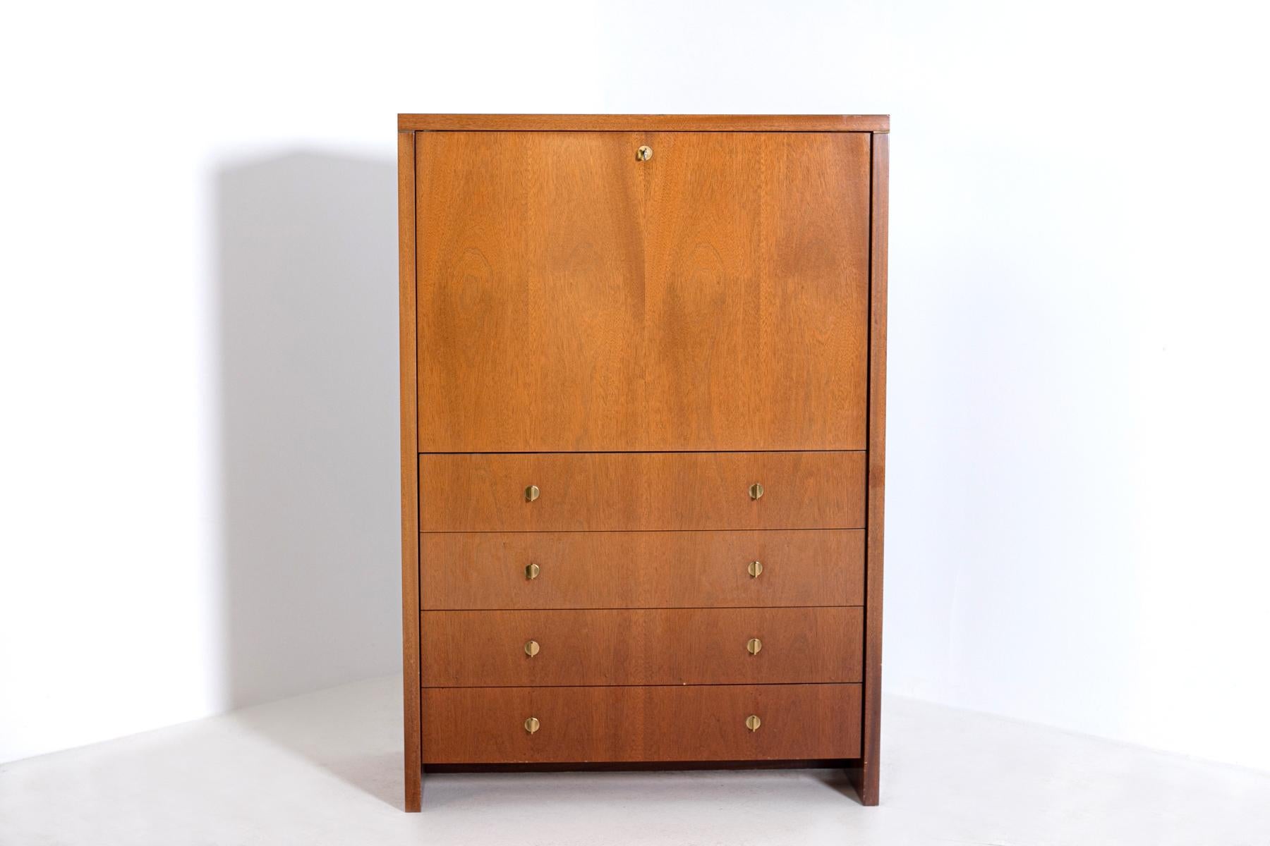 Elegant Secretaire designed by Pierre Balmain original French. The piece of furniture is easily transformable by means of the flap door, which is pre to give space to a small desk. Inside there are several drawers and containers, 1980s. Each drawer