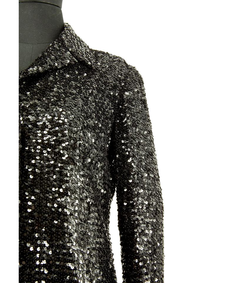 1970s Pierre Balmain fully sequinned black jacket with shiny black domed buttons.

Pierre Balmain label.Original 1970s

Vintage designer jackets sourced by Stelios Hawa with the objective to bridge the gap between popular designers, Couture and