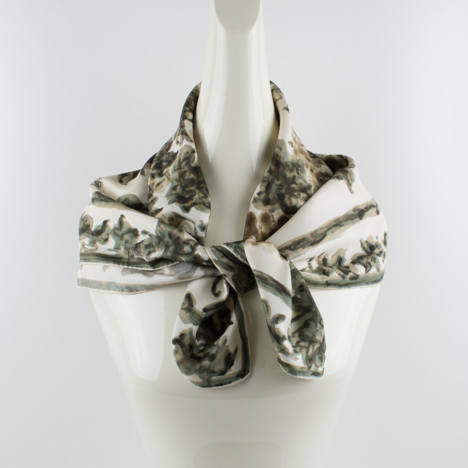 This exquisite silk scarf from Pierre Balmain Paris is artistically crafted to resemble a beautiful painting. This lovely piece features a tangle of grape leaves and bunches of grapes in a combination of sage green, light brown, and beige colors on
