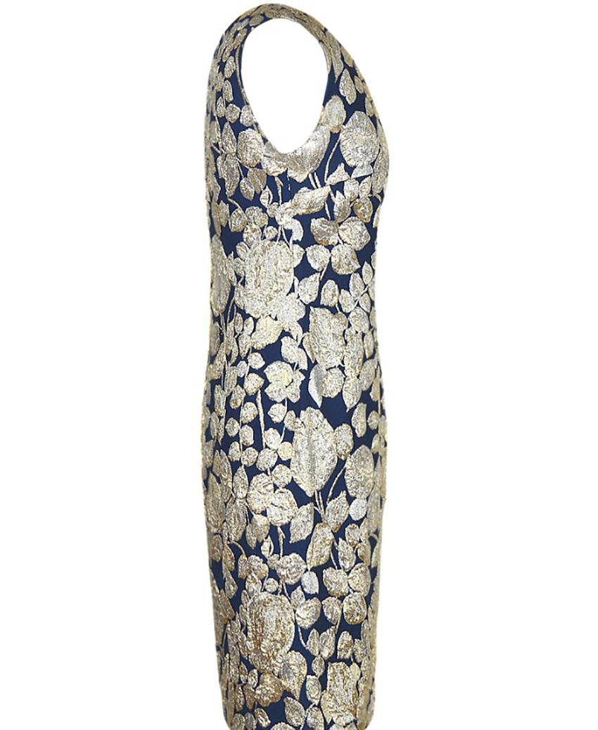 PIERRE BALMAIN 

Rare vintage Pierre Balmain haute couture dress is made from deep blue brocade silk decorated with golden and silver threads. 
A classic 1960s silhouette, silk lining, zip fastening.

Content: brocade silk

Bust	 37