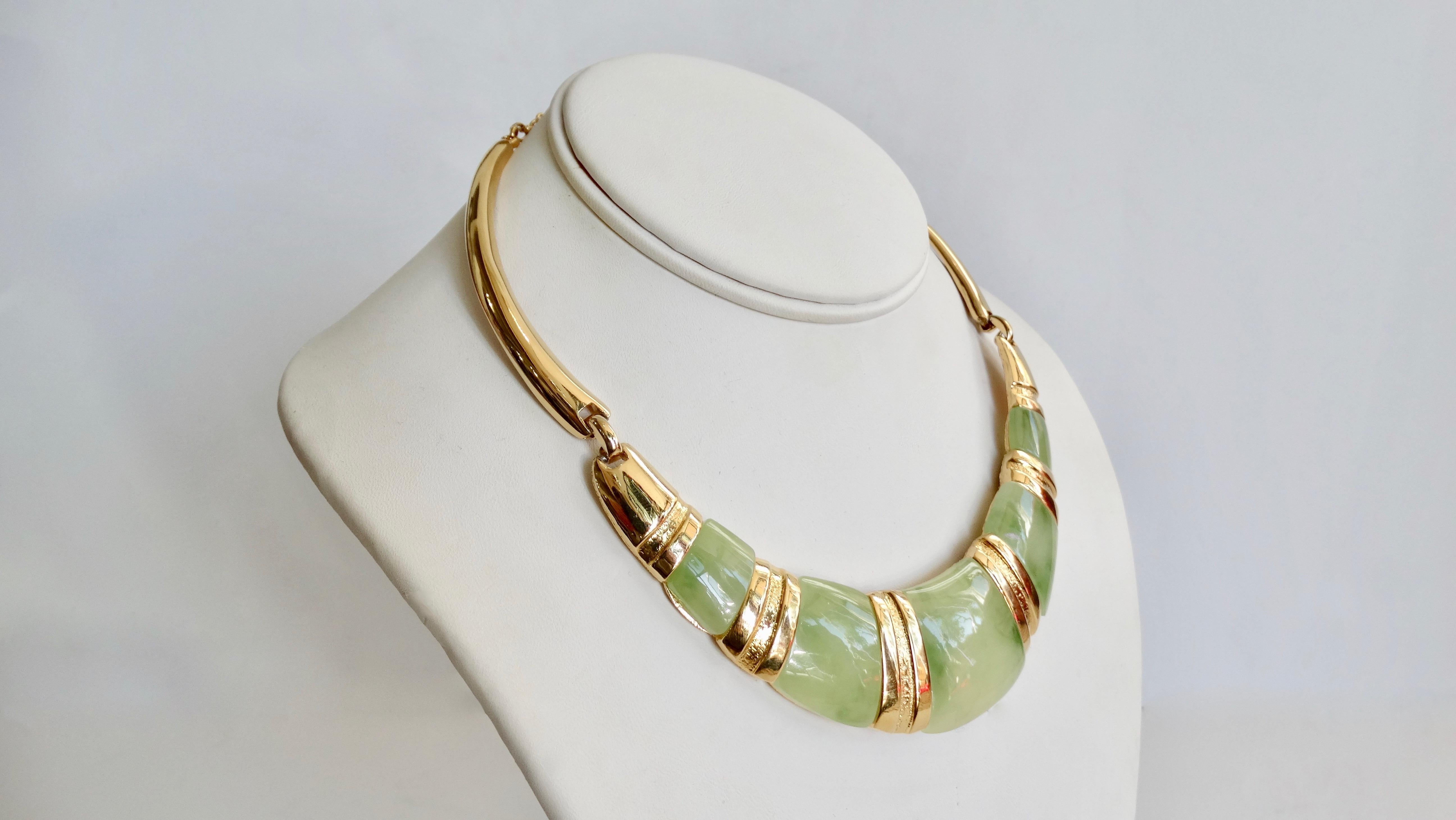 Elegance is key and this Pierre Cardin choker is the perfect piece! Circa 1970s, this choker is gold plated and features Jade stones separated with smooth and textured gold hardware. Adjustable hook closure with Pierre Cardin logo charm. Whether you
