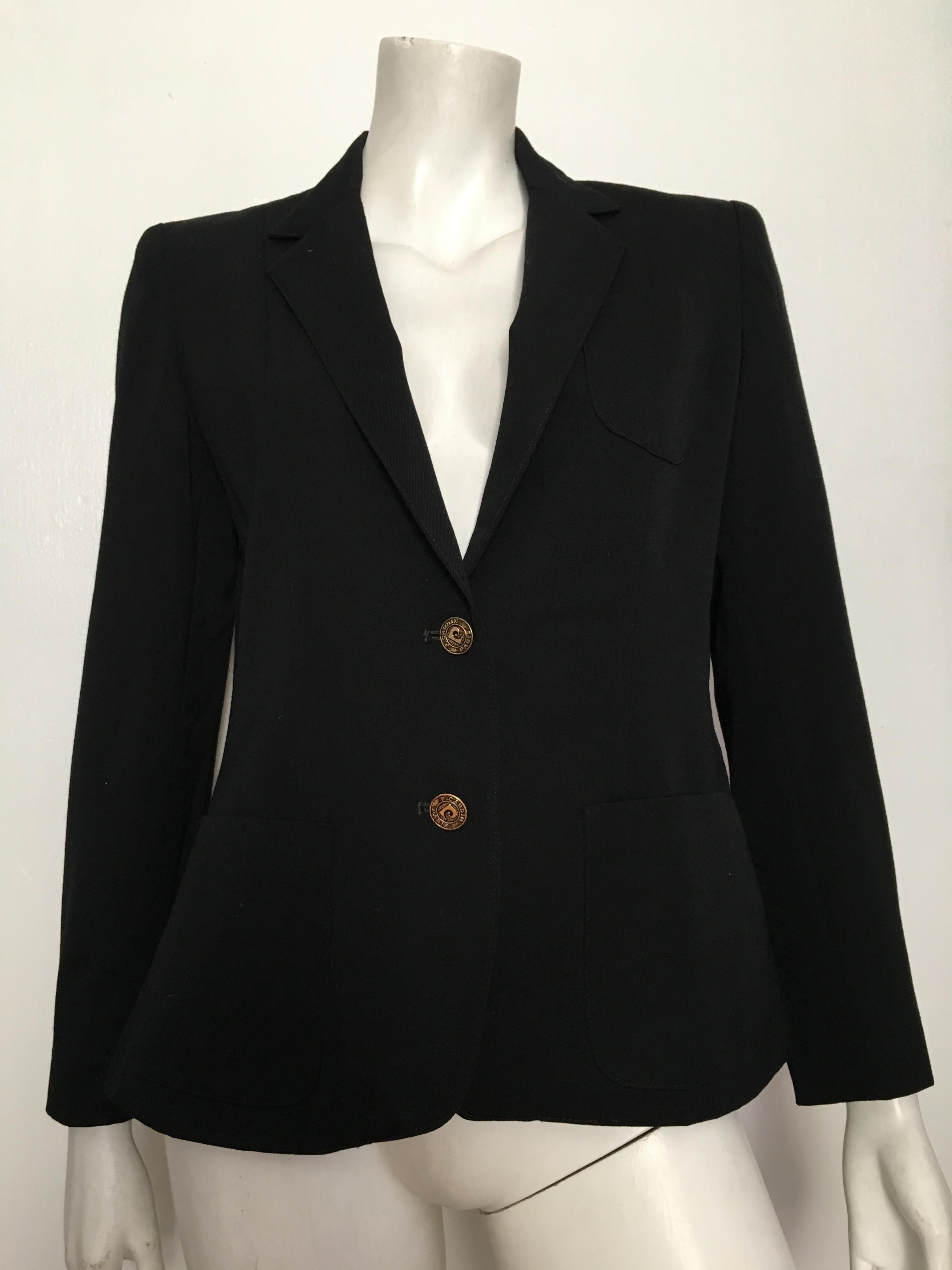Pierre Cardin 1980s black wool jacket with logo buttons & front pockets is labeled a size 9/10 but fits like a size 6.  Matilda the Mannequin is a size 4 and this jacket is just slightly larger on her so a size 6 will work. Ladies if you are looking