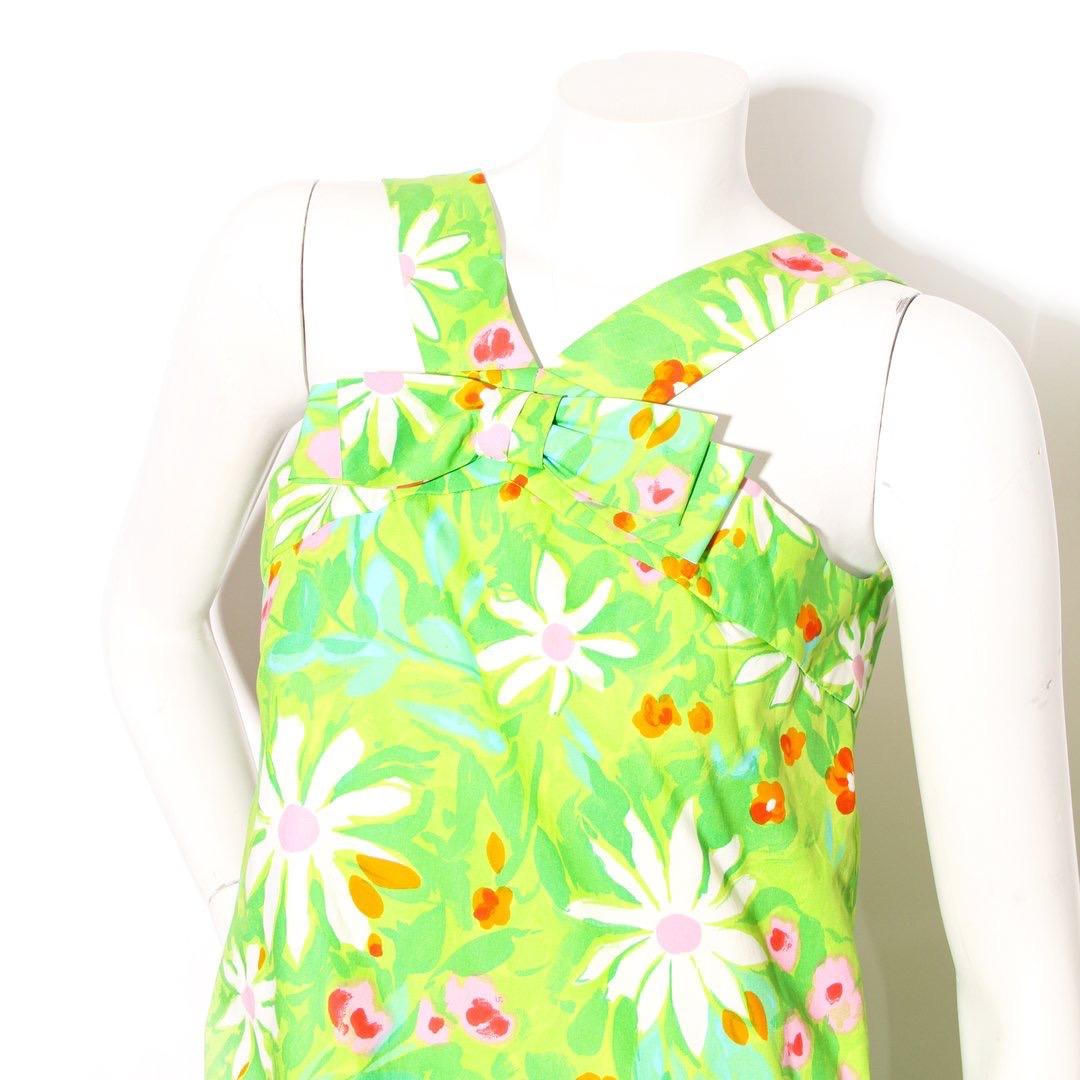 Vintage floral A-line dress by Pierre Cardin
Circa mid to late 1960s
Green 
Multicolor flower detail
Sleeveless
Zip back closure
A-line fit
V-dip in back 
Condition: Excellent vintage condition. (see photos) 
Size/Measurements: (approximate, taken