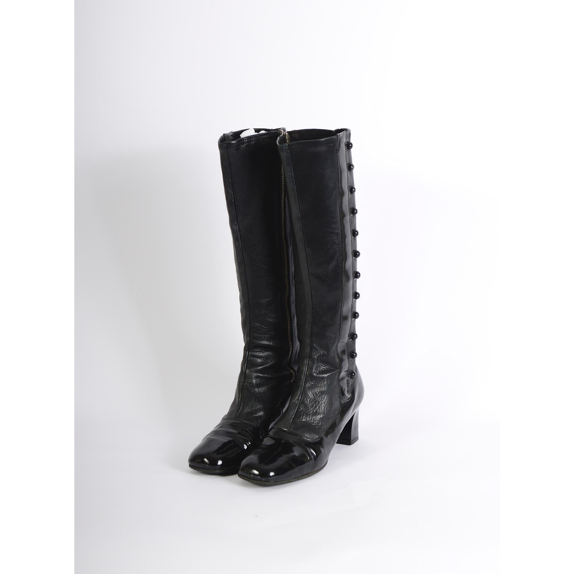 Pierre Cardin Archive Museum-Worthy Vintage Space-Age Black Boots.

These boots appear to have never been worn, but they are not new. The leather part of the boot shows no signs of wear, tears, or fading, and even the original zippers are fully