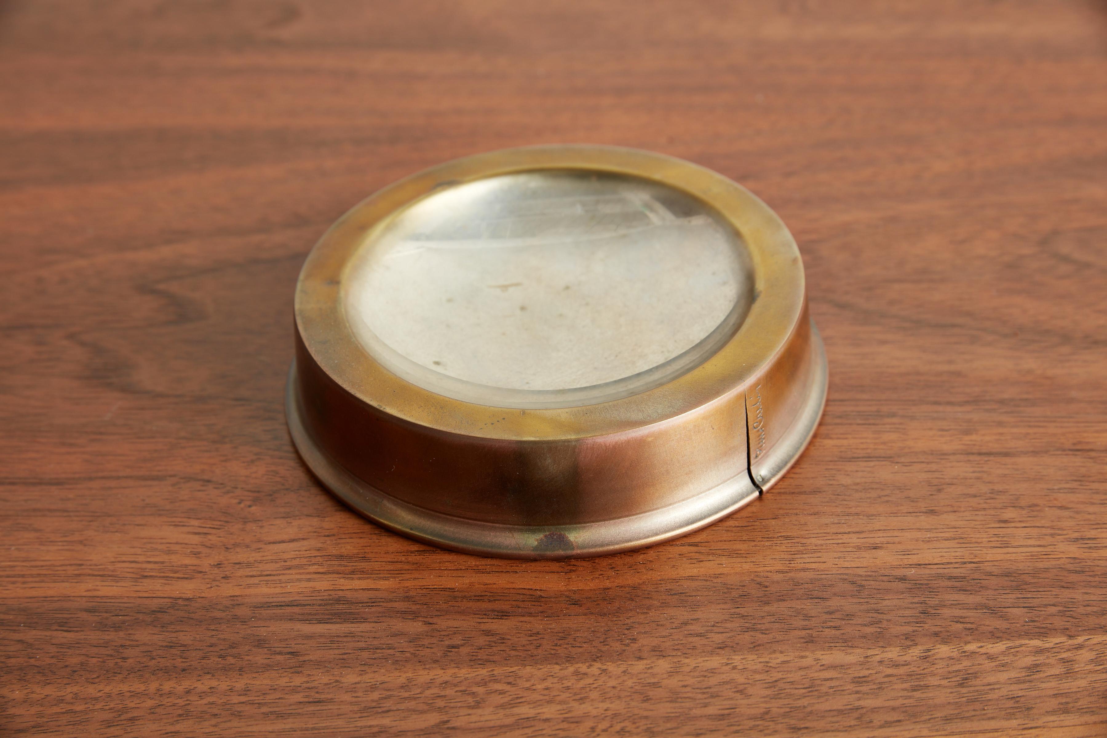 Pierre Cardin brass ashtray with wonderful patina
Signed 
France, circa 1970s.