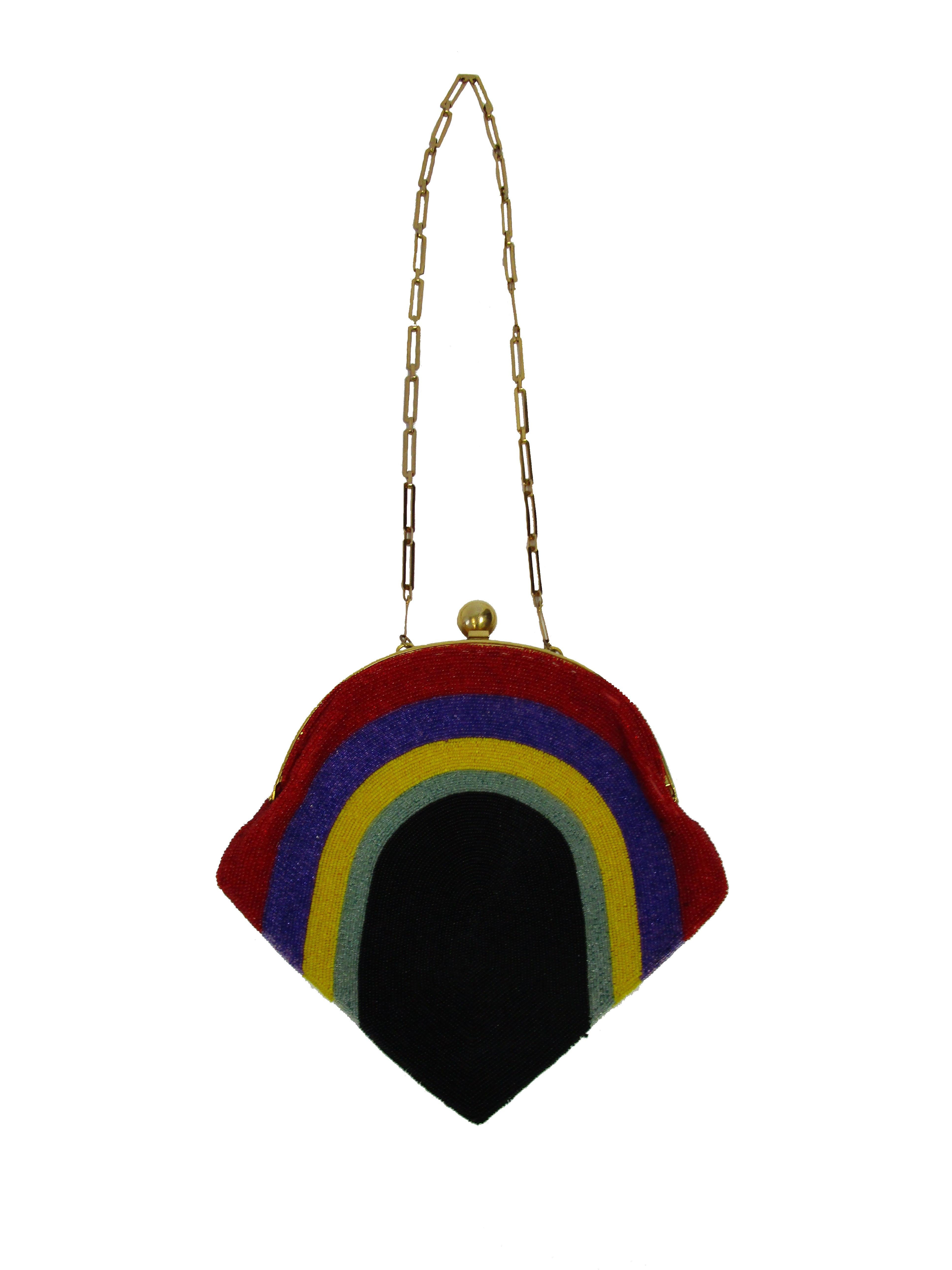 Vintage Pierre Cardin evening purse. The body of this gorgeous, fully beaded purse features five graphic rainbow-like loops of color in red, purple, yellow, sage green, and black. The finely crafted purse has an optional 13' gold-tone bar chain