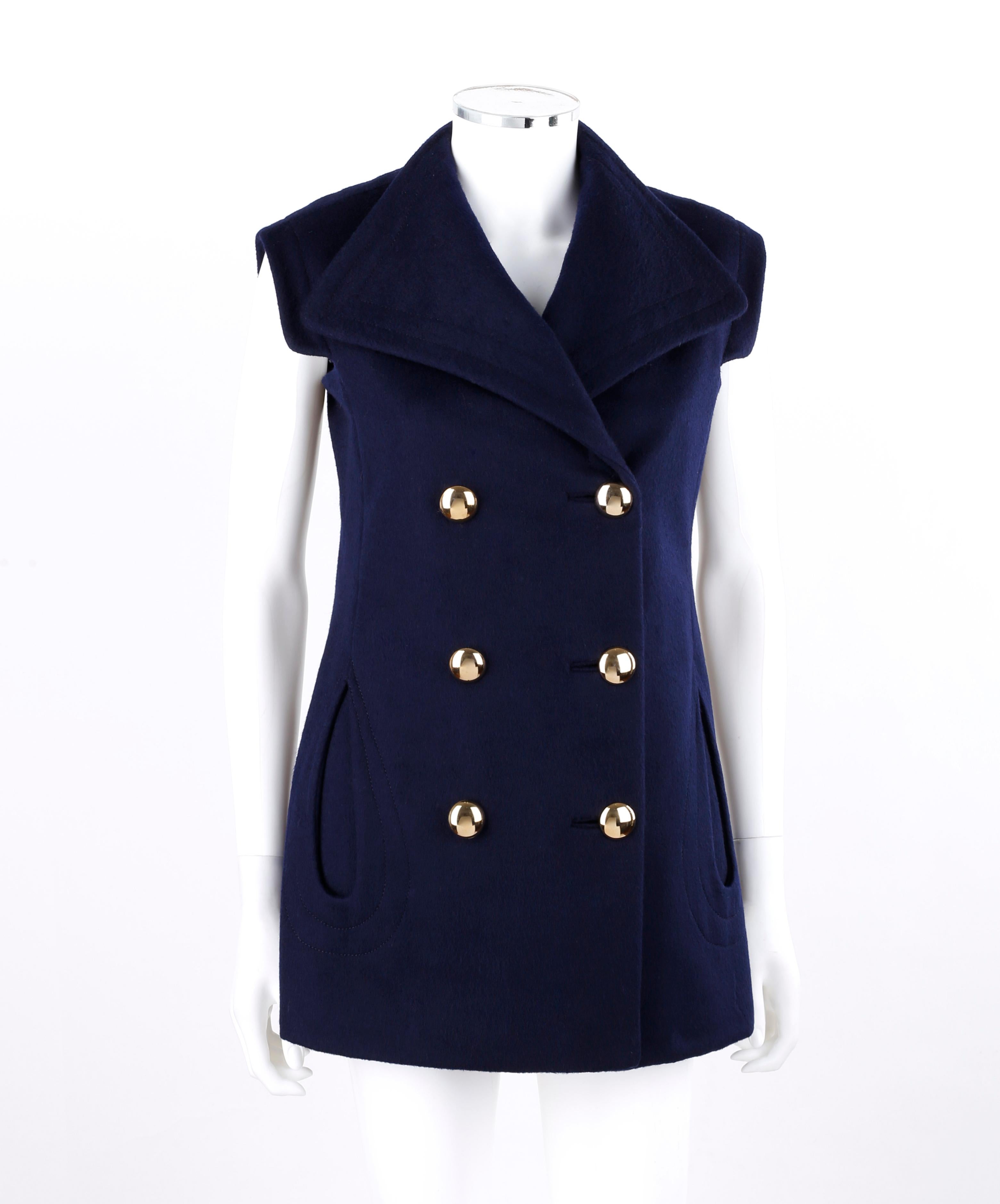 PIERRE CARDIN c.1960’s Navy Blue Extended Shoulder Double Breasted Vest Jacket
 
Circa: 1960’s
Label(s): Pierre Cardin Paris New York; Martha (Palm Beach, New York, Miami Beach)
Designer: Pierre Cardin
Style: Sleeveless double-breasted vest