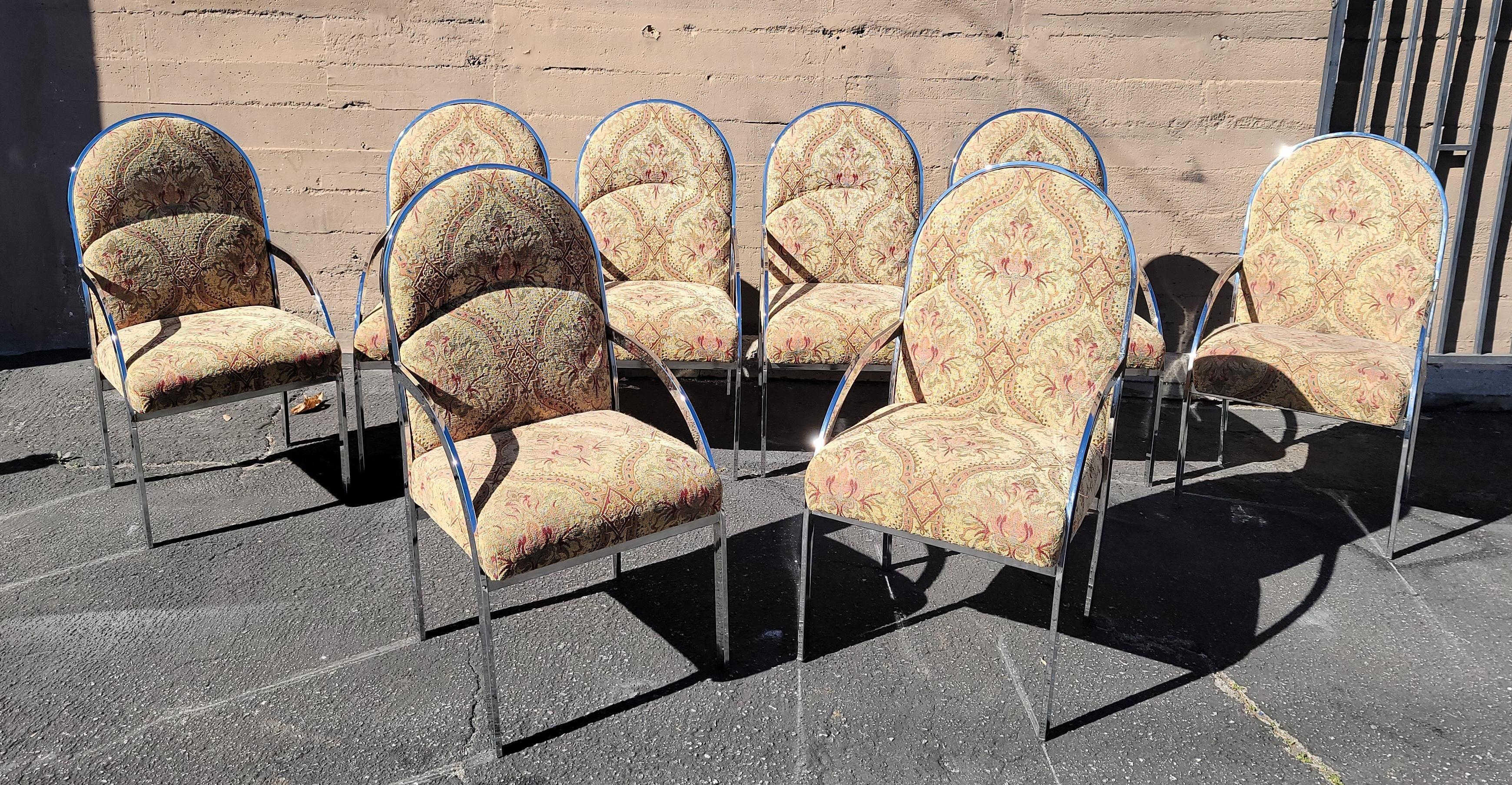 Set of eight Pierre Cardin Chrome armchairs. The fabric for these chairs are in good condition the chrome may need a little polish, the overall look of the eight chairs is fabulous.