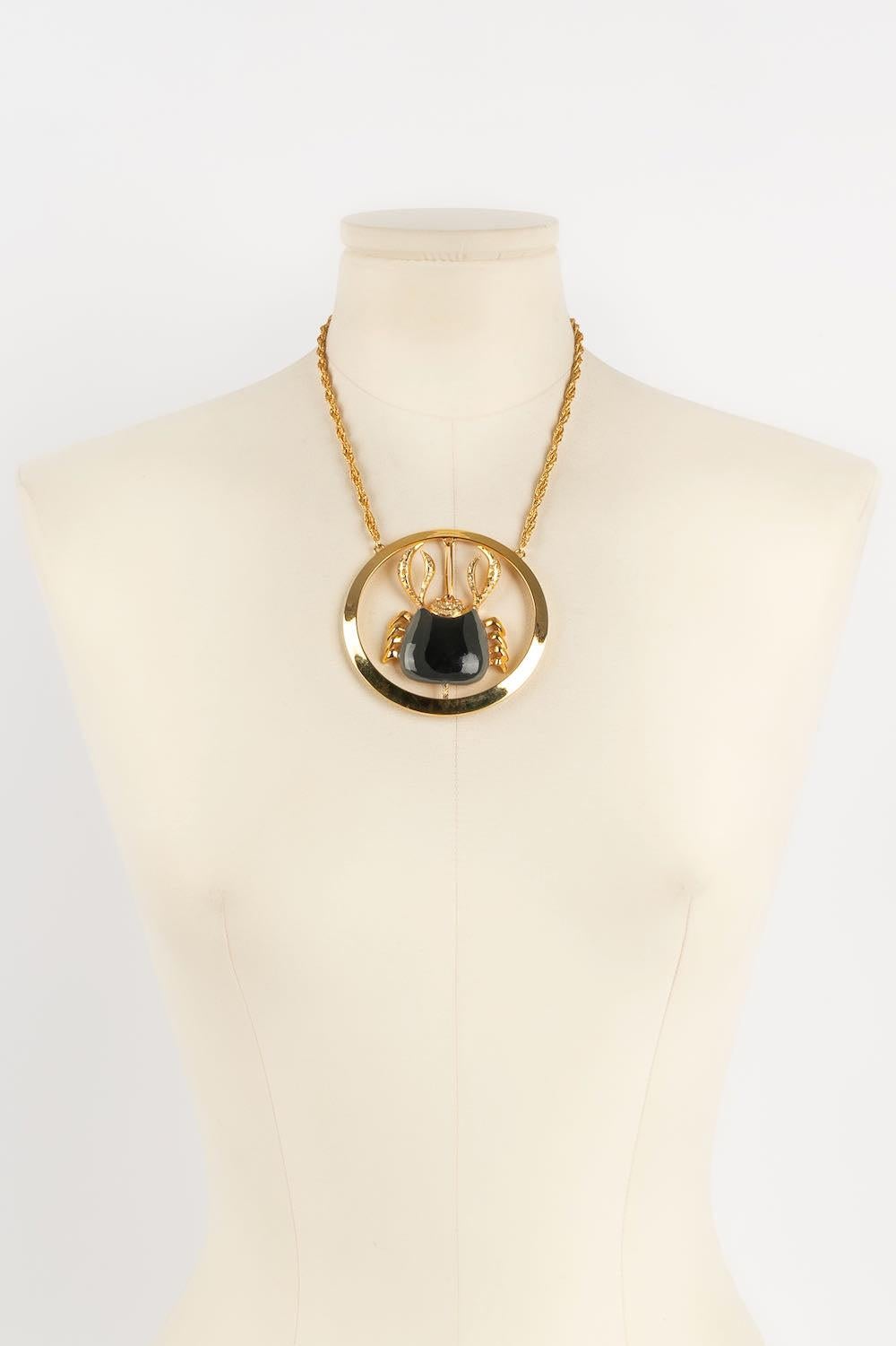 Pierre Cardin -Golden metal, rhinestone and enamel necklace.

Additional information: 

Dimensions: 
Length: 44 cm

Condition: 
Very good condition

Seller Ref number: BC1