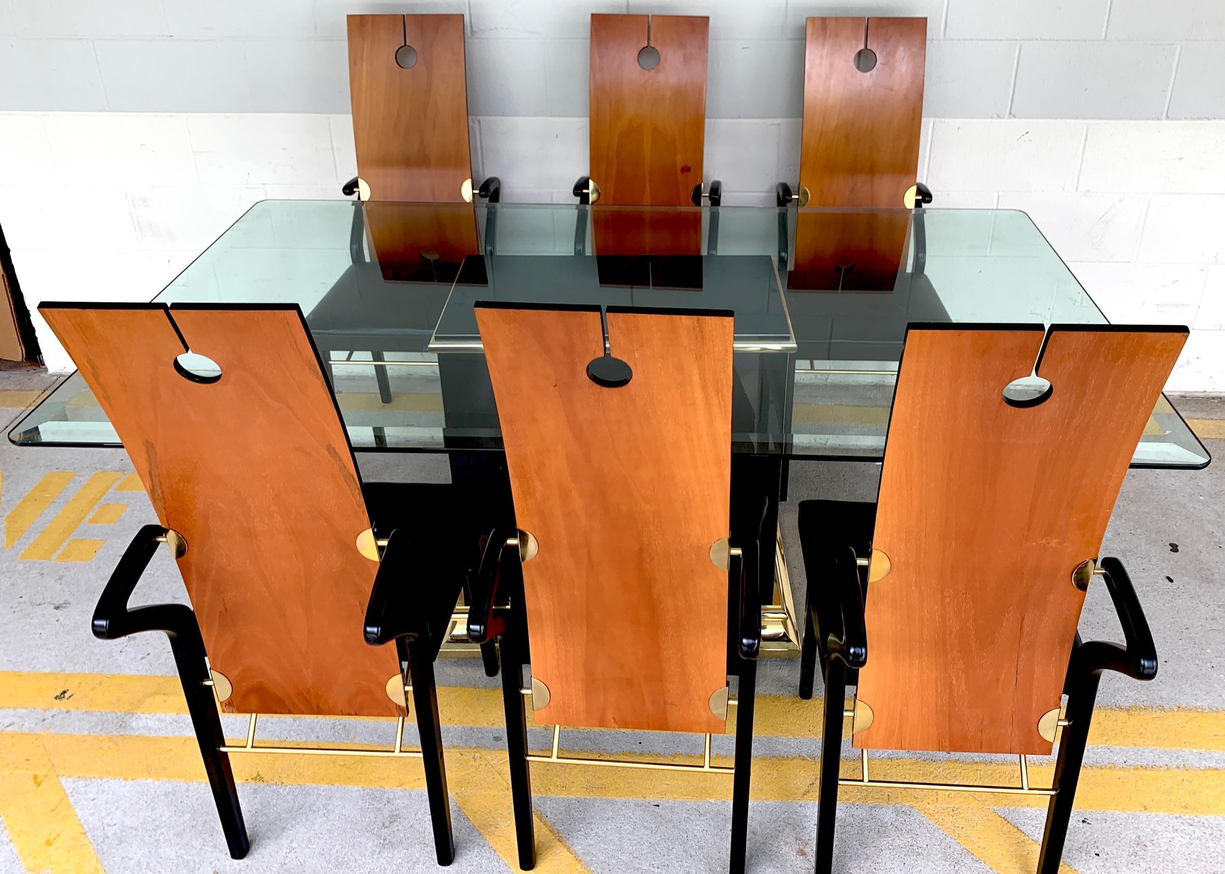 Pierre Cardin dining room set, 6 keyhole back armchairs #26406 and pedestal table, 1989
Complete with six iconic Pierre Cardin keyhole back arm chairs #26406, each one signed in gold script on the back of the chair.
Each chair measures: 17” W x