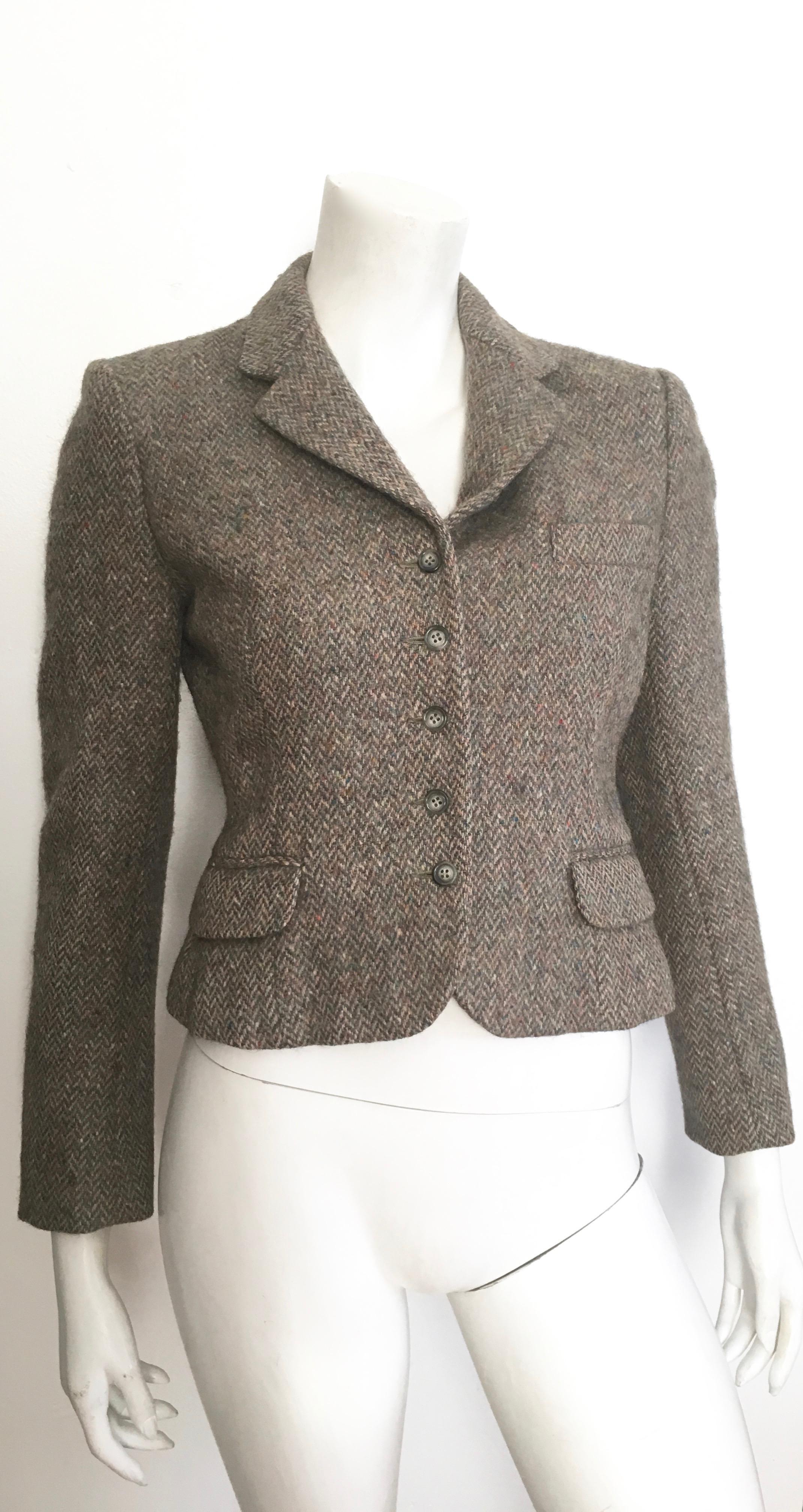 Pierre Cardin for Bloomingdale's 1960s wool cropped jacket is labeled a size 6 but fits like a size 4.  Fits Matilda the Mannequin who wears a size 4 perfectly, this is not a modern day size 6.  The wool fabric was imported from Ireland. 
Jacket is